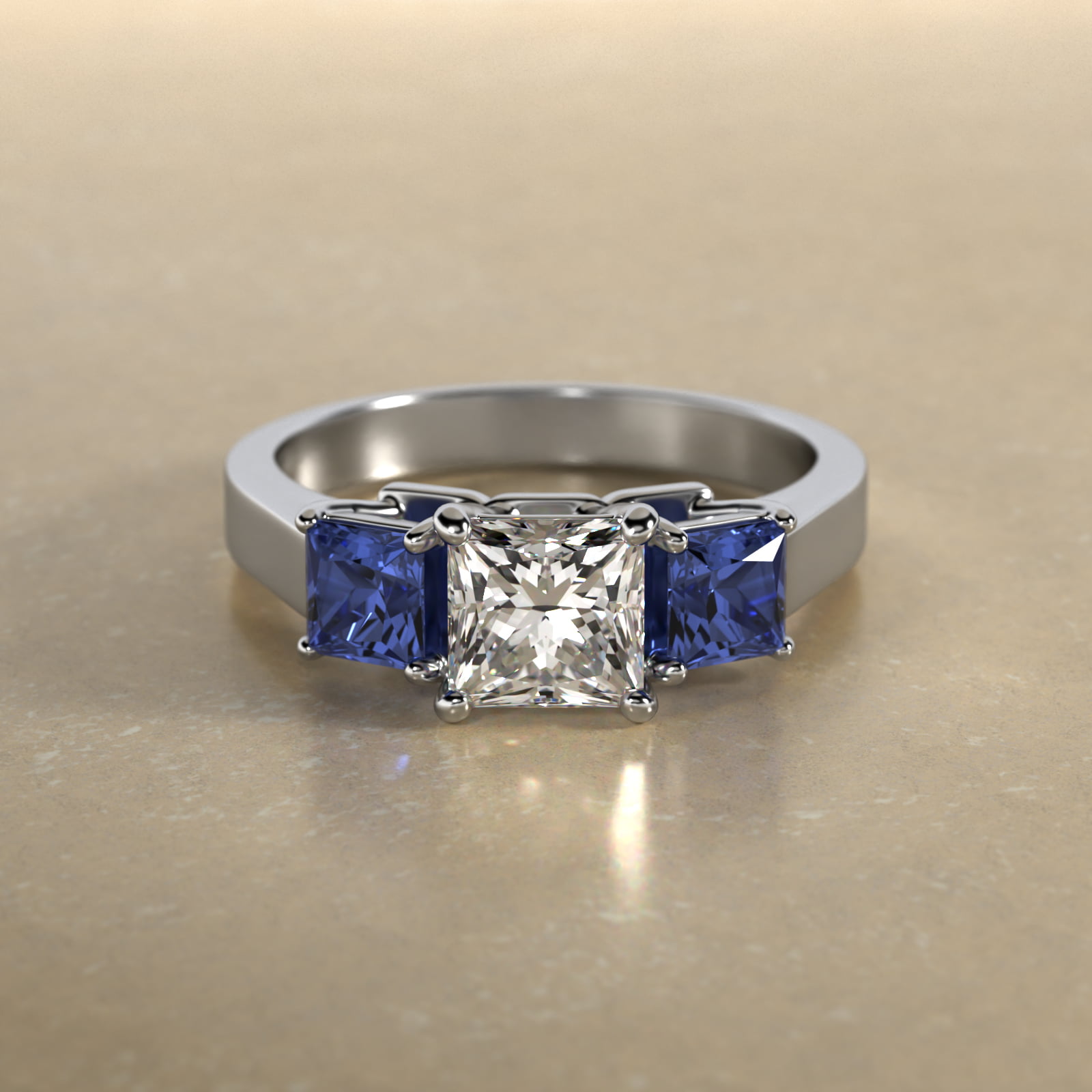 Princess Cut Blue Sapphire Three Stone Engagement Ring In Platinum
