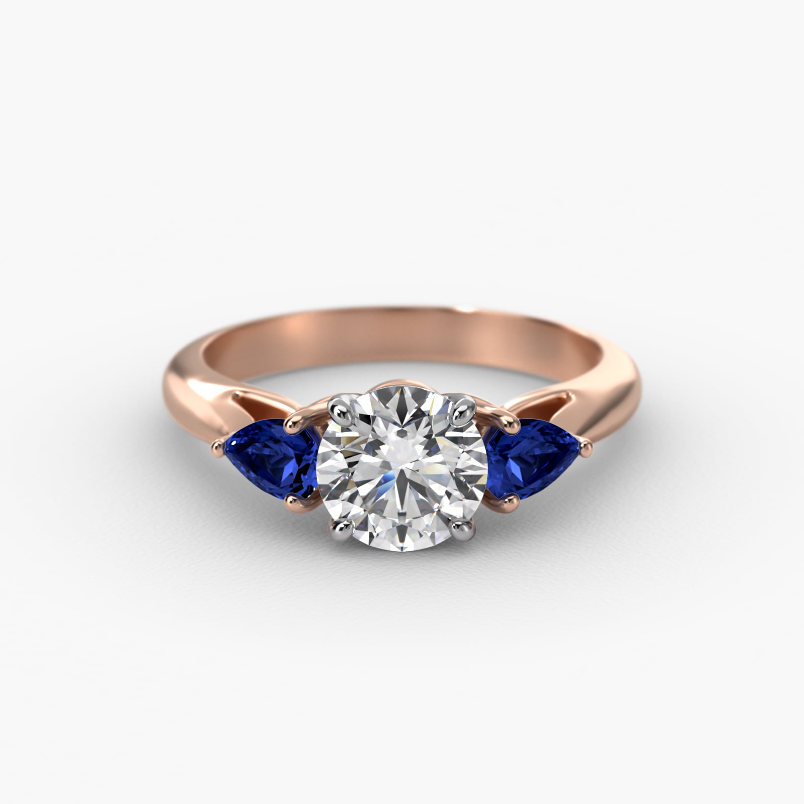 Pear Shaped Blue Sapphire Three Stone Engagement Ring In 14K Rose Gold