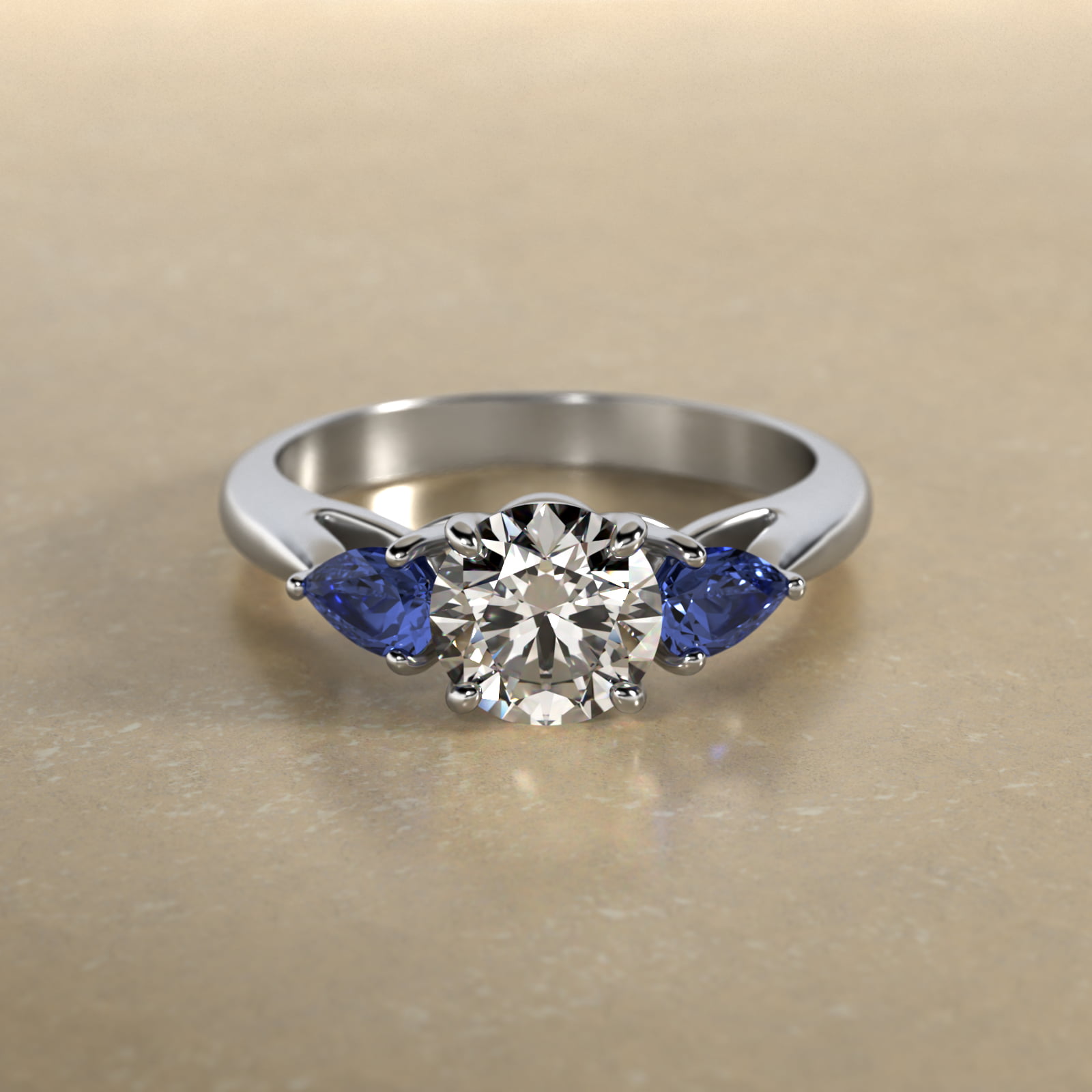 Pear Shaped Blue Sapphire Three Stone Engagement Ring In 14K White Gold