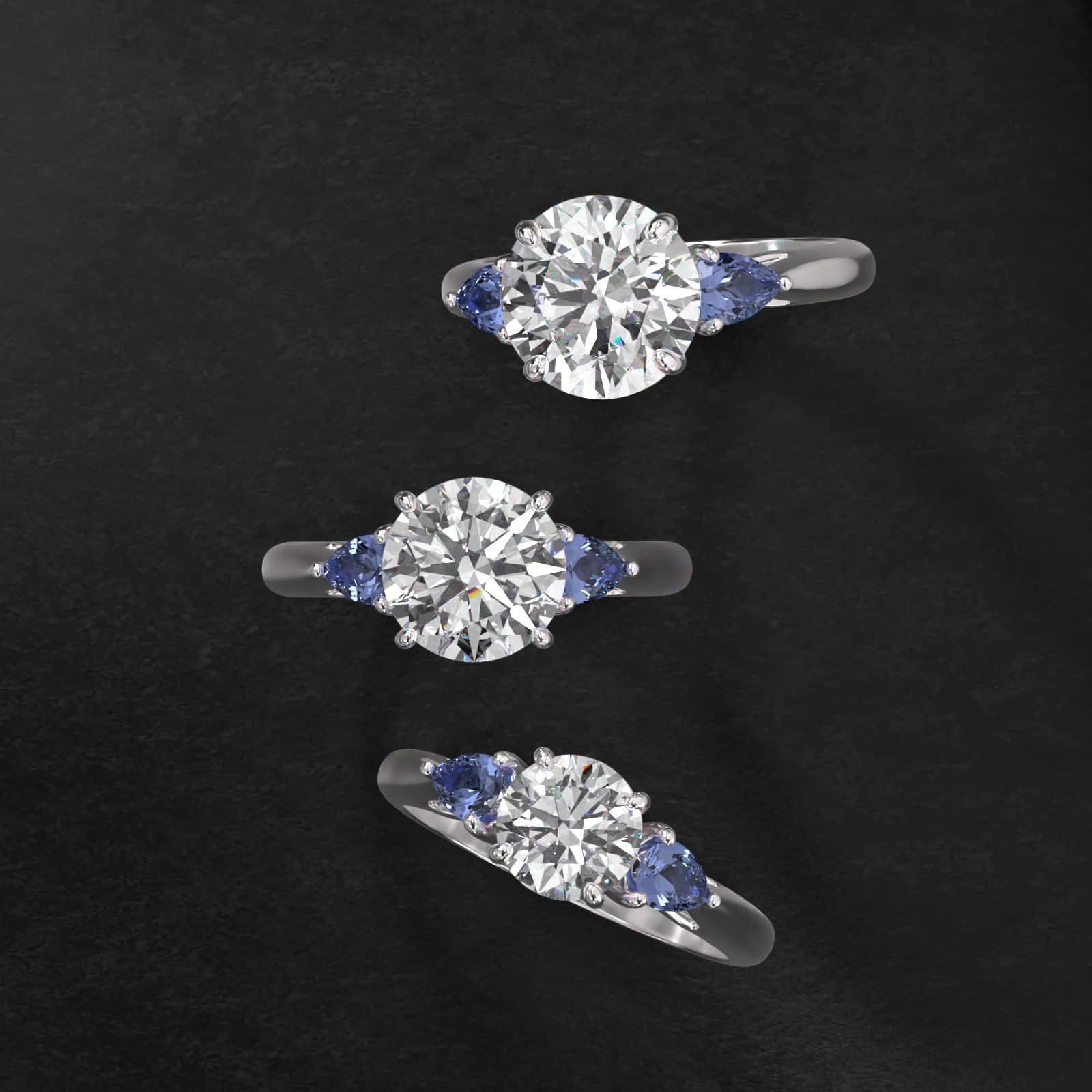 Pear Shaped Blue Sapphire Three Stone Engagement Ring In 14K White Gold