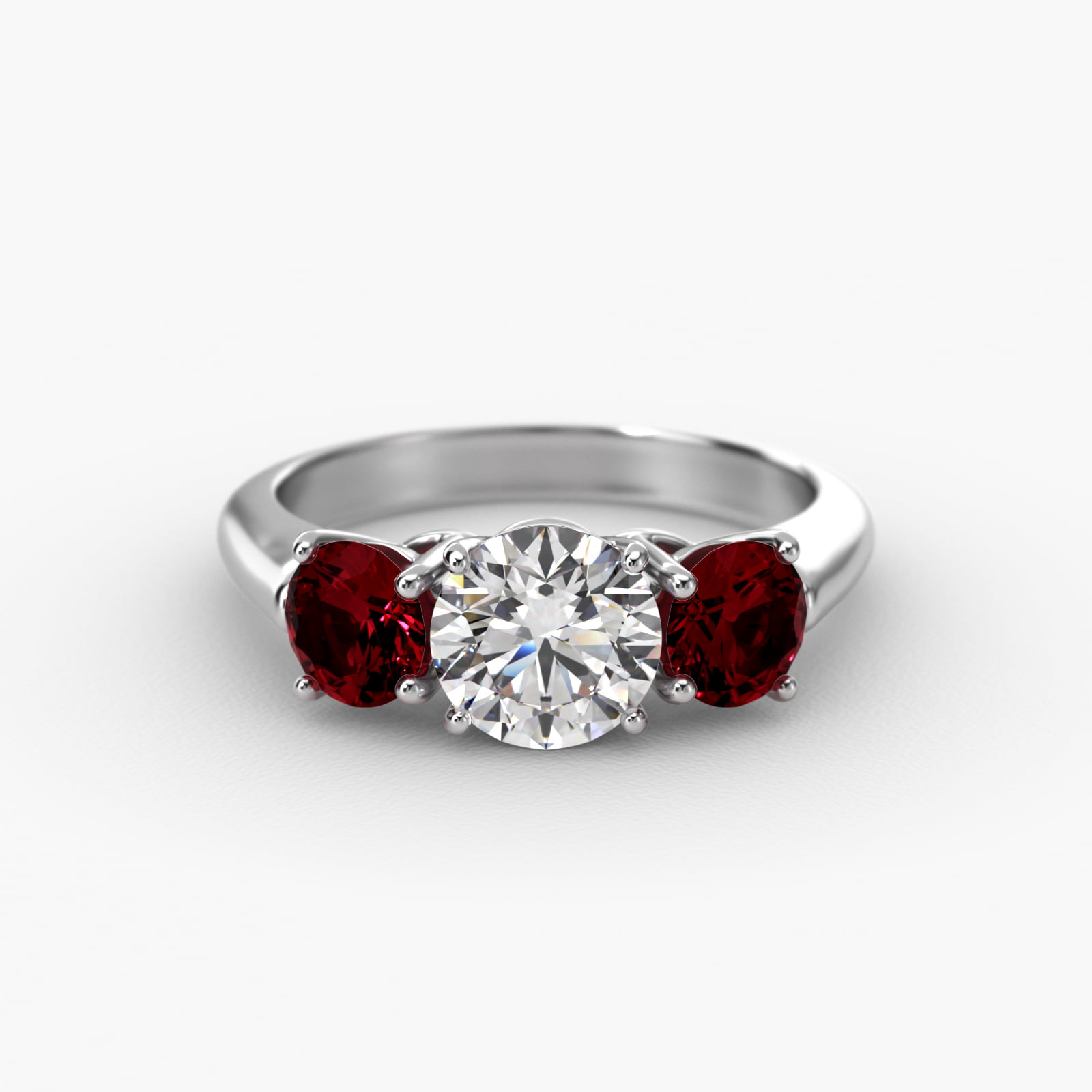 Round Ruby Three Stone Engagement Ring In Platinum