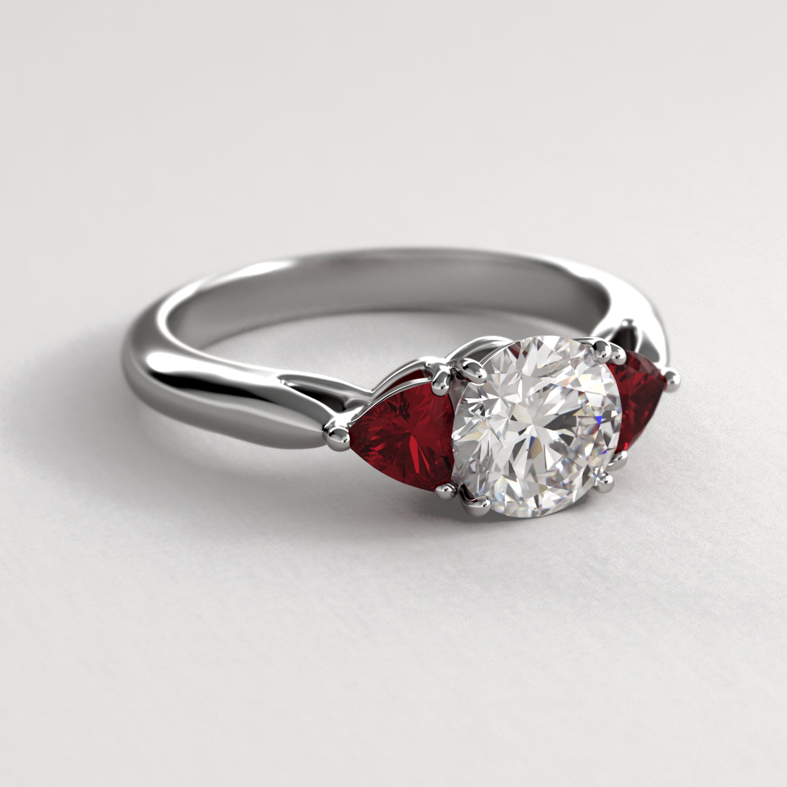 Trillion Cut Ruby Three Stone Engagement Ring In 14K White Gold
