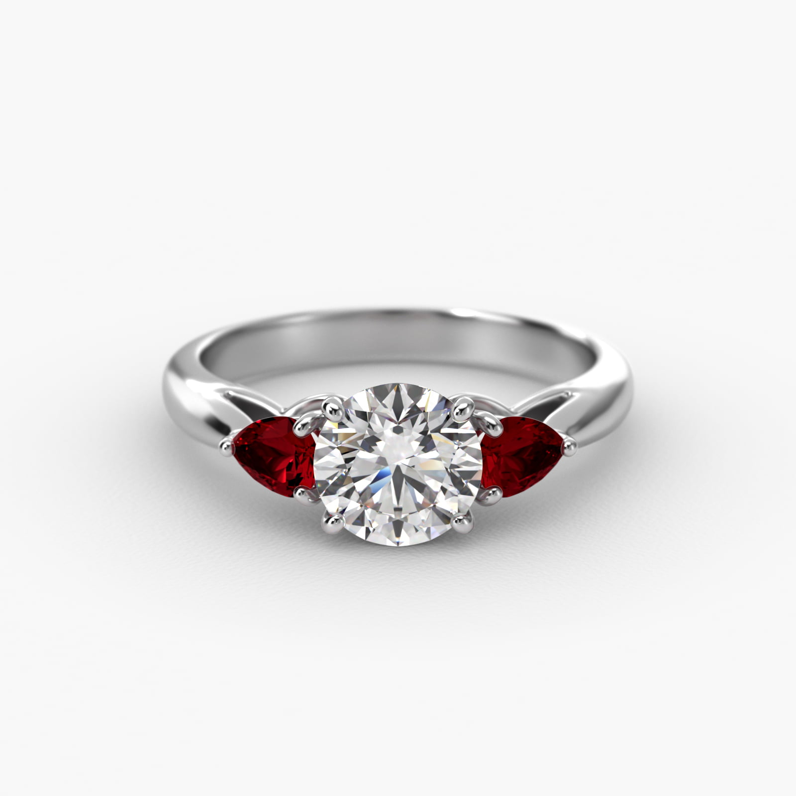 Pear Shaped Ruby Three Stone Engagement Ring In 14K White Gold