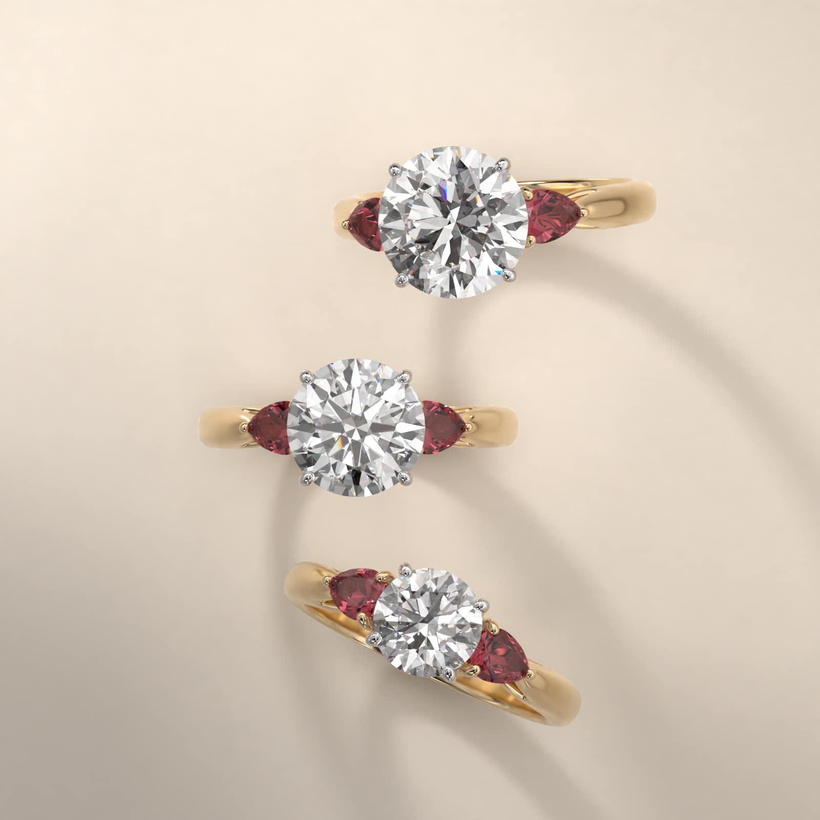 Pear Shaped Ruby Three Stone Engagement Ring In 14K Yellow Gold