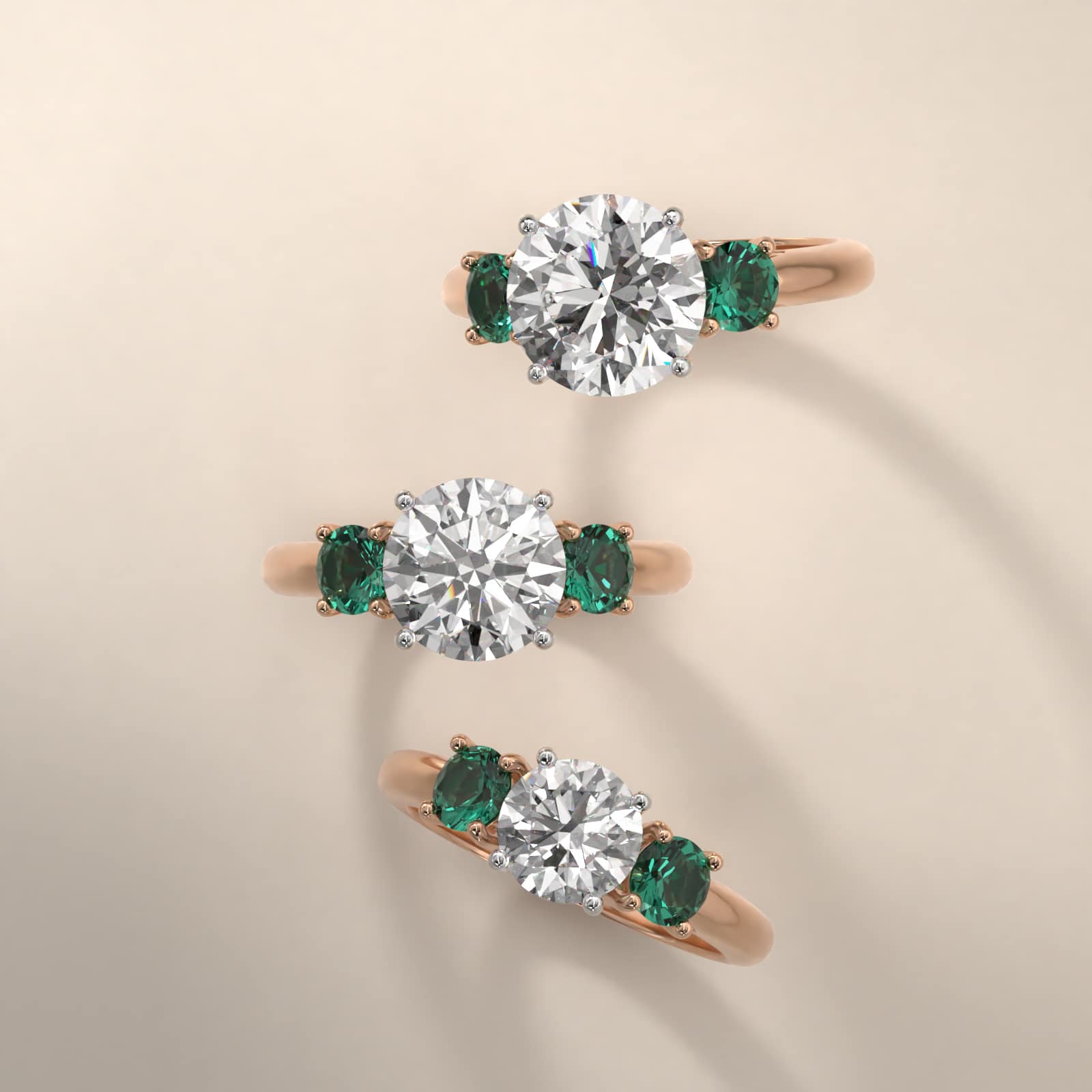 Round Emerald Three Stone Engagement Ring In 14K Rose Gold