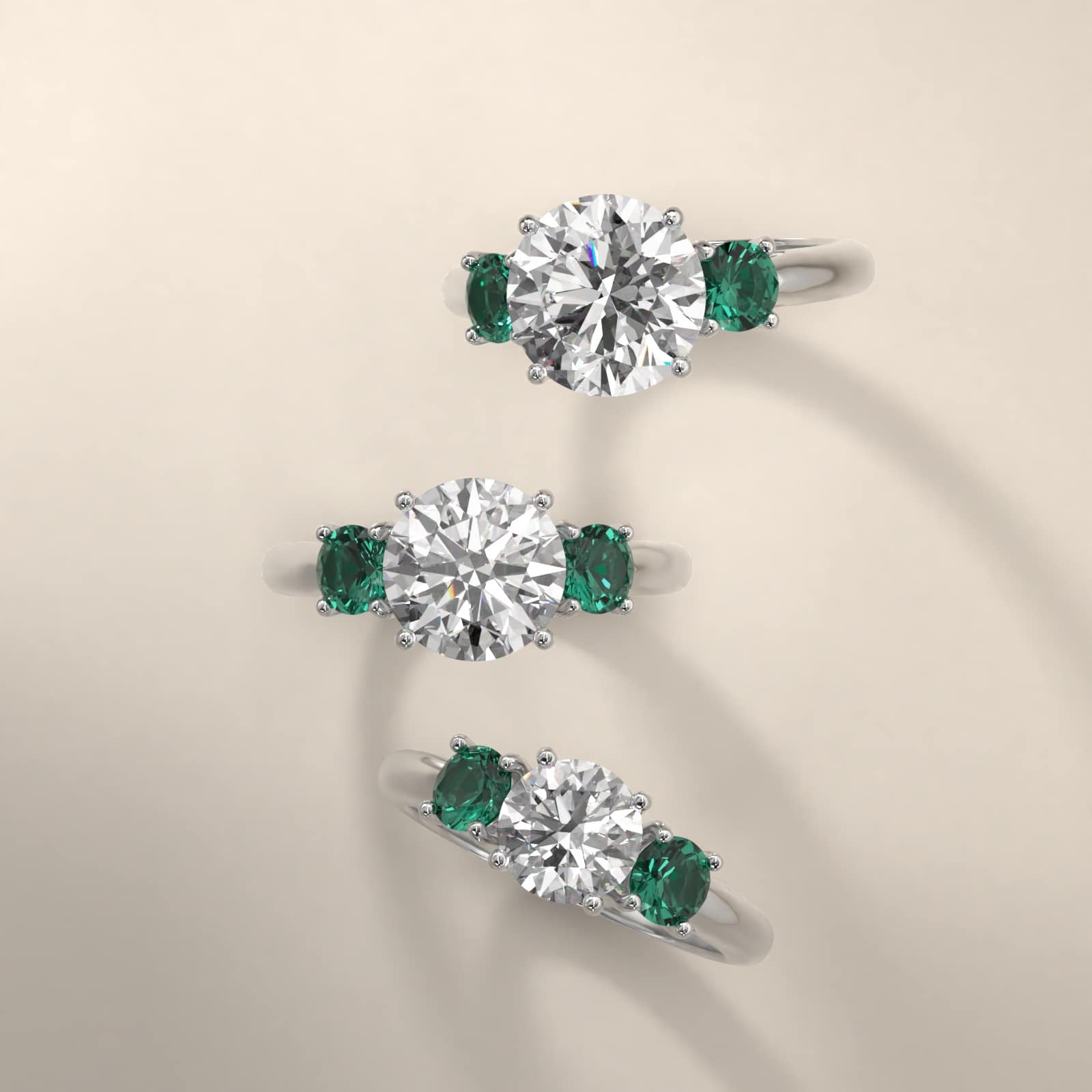 Round Emerald Three Stone Engagement Ring In 14K White Gold