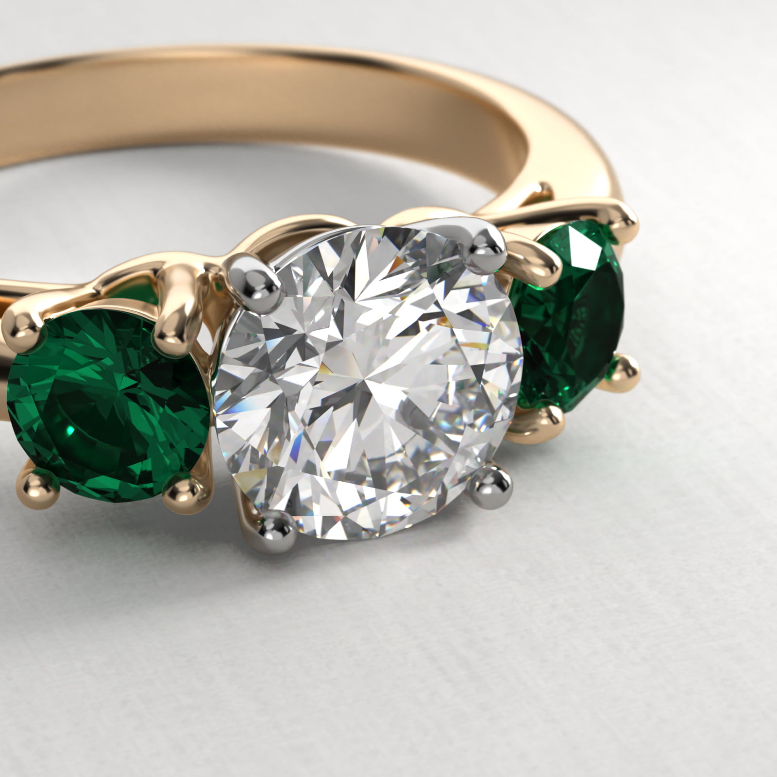 Round Emerald Three Stone Engagement Ring In 18K Yellow Gold