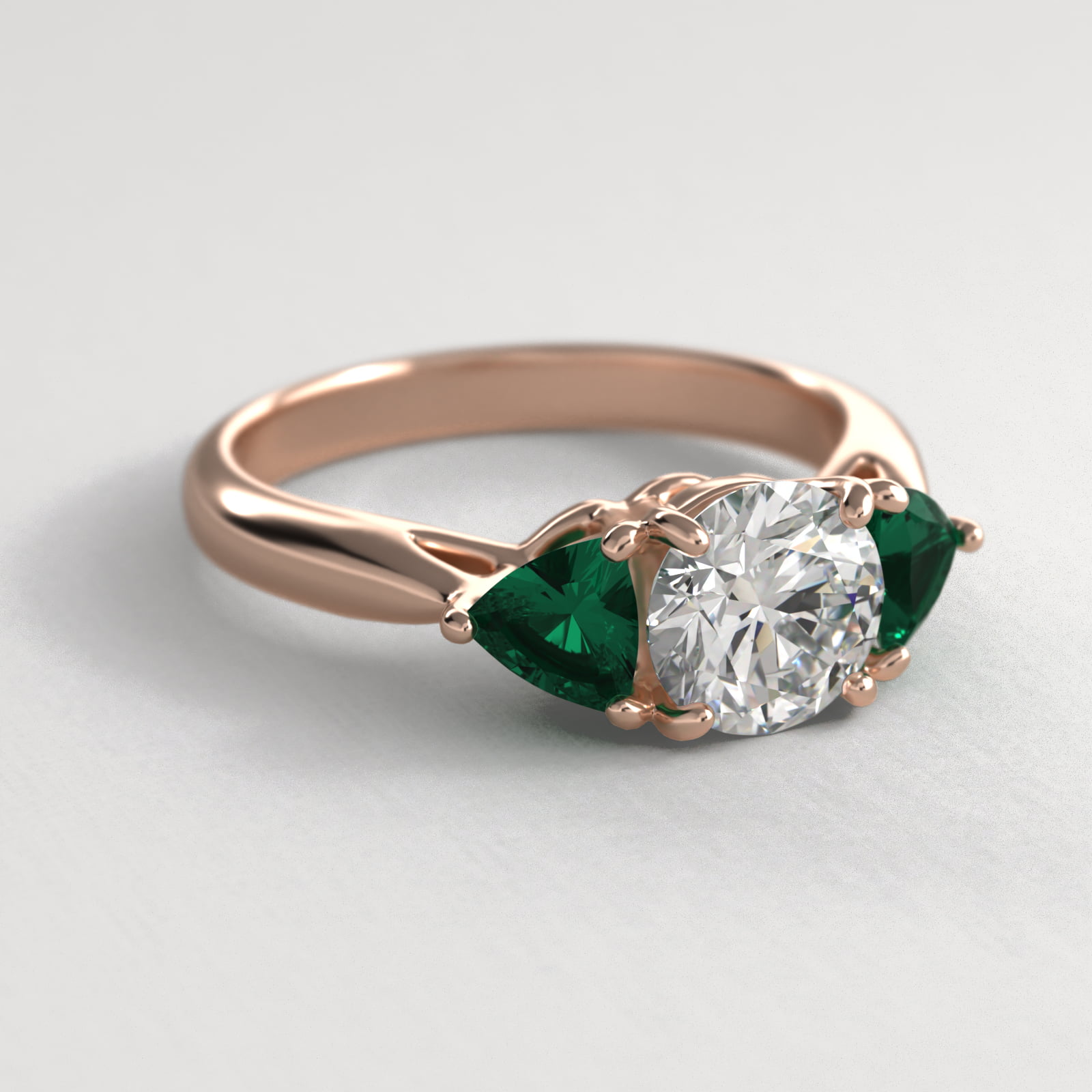 Trillion Cut Emerald Three Stone Engagement Ring In 14K Rose Gold