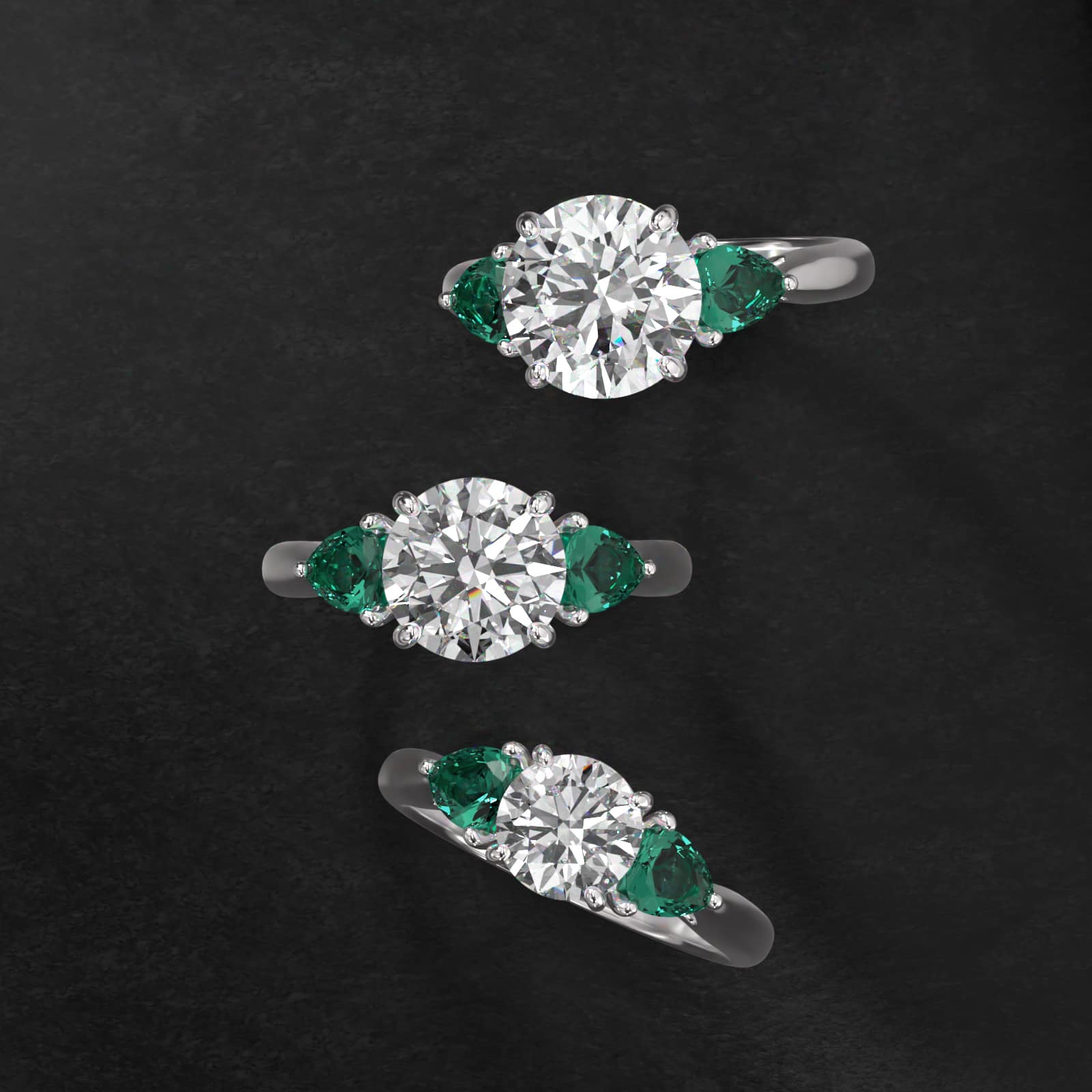 Pear Shaped Emerald Three Stone Engagement Ring In 14K White Gold