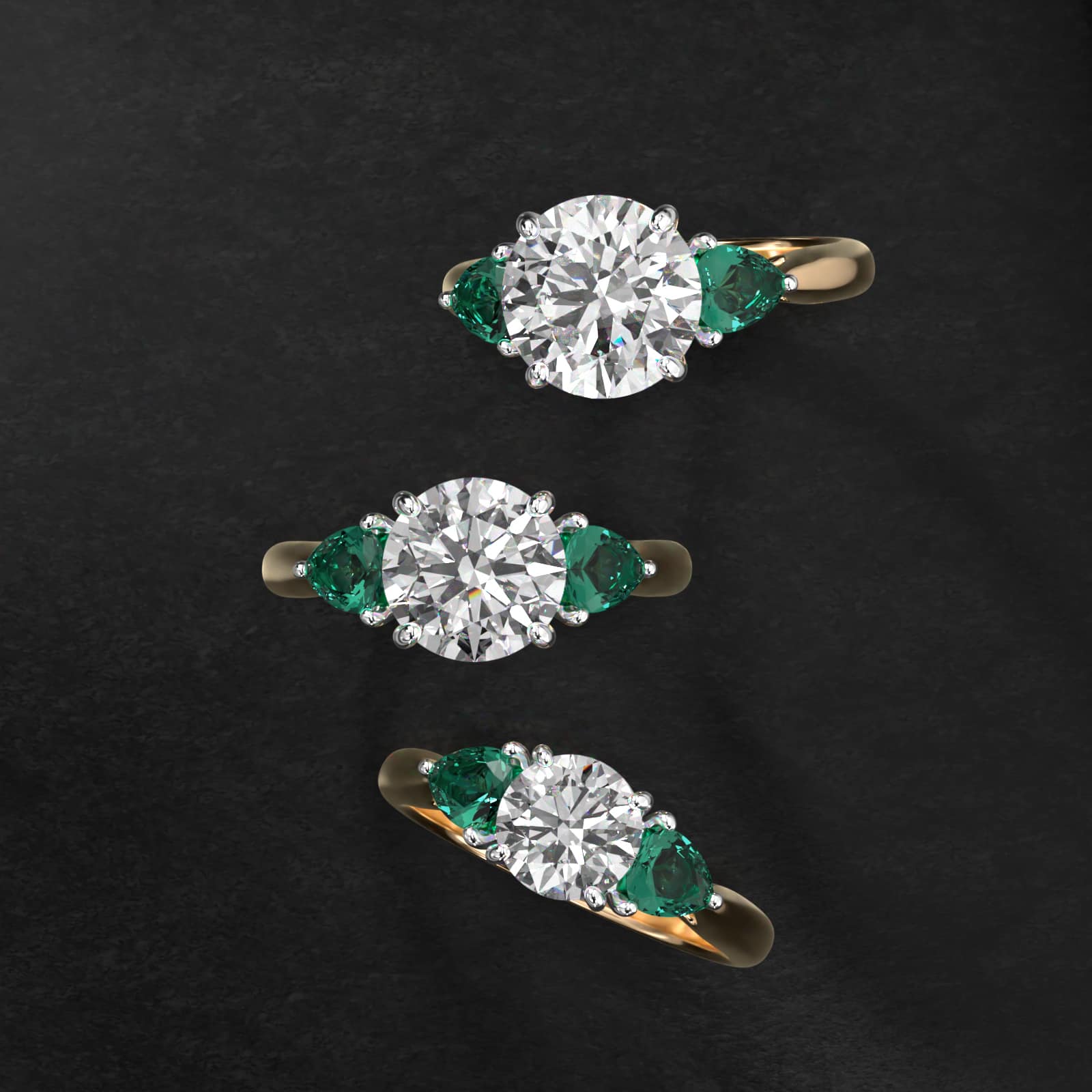 Pear Shaped Emerald Three Stone Engagement Ring In 18K Yellow Gold