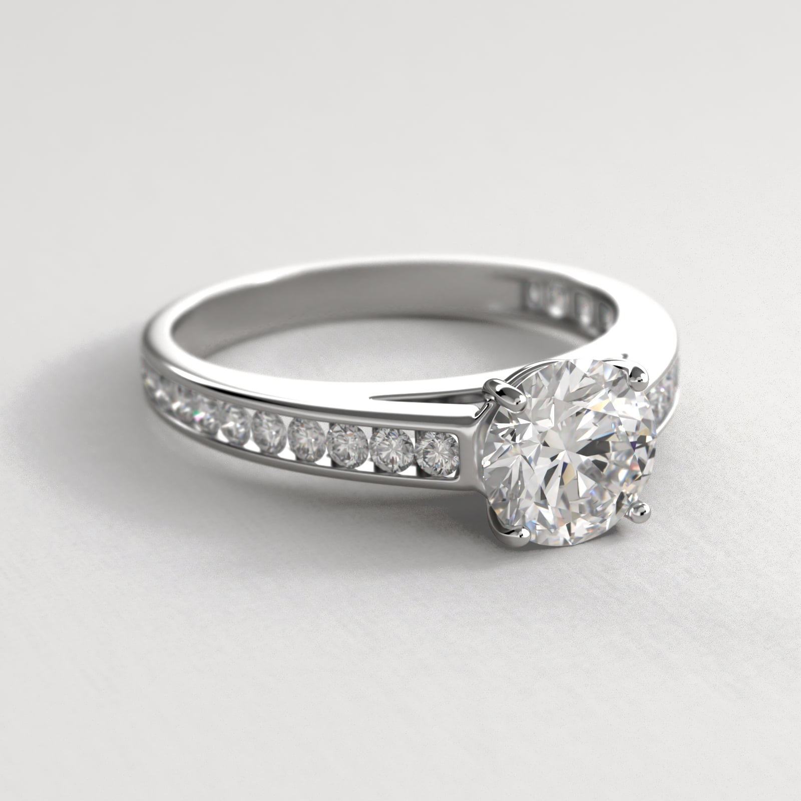Engagement Ring With Channel Set Round Diamonds In 18K White Gold