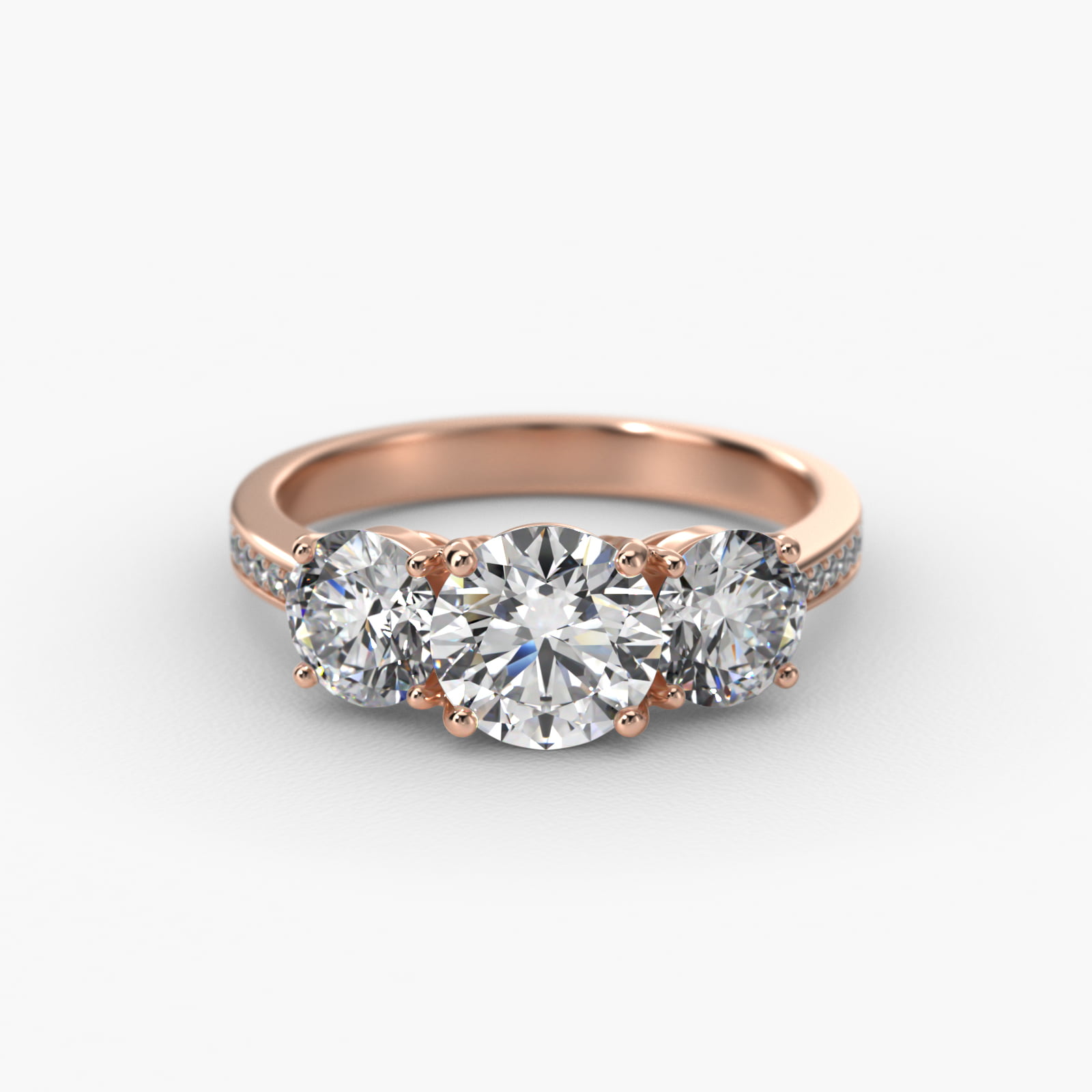 Round Diamond Three Stone Engagement Ring With Pavé Set Diamonds In 14K Rose Gold