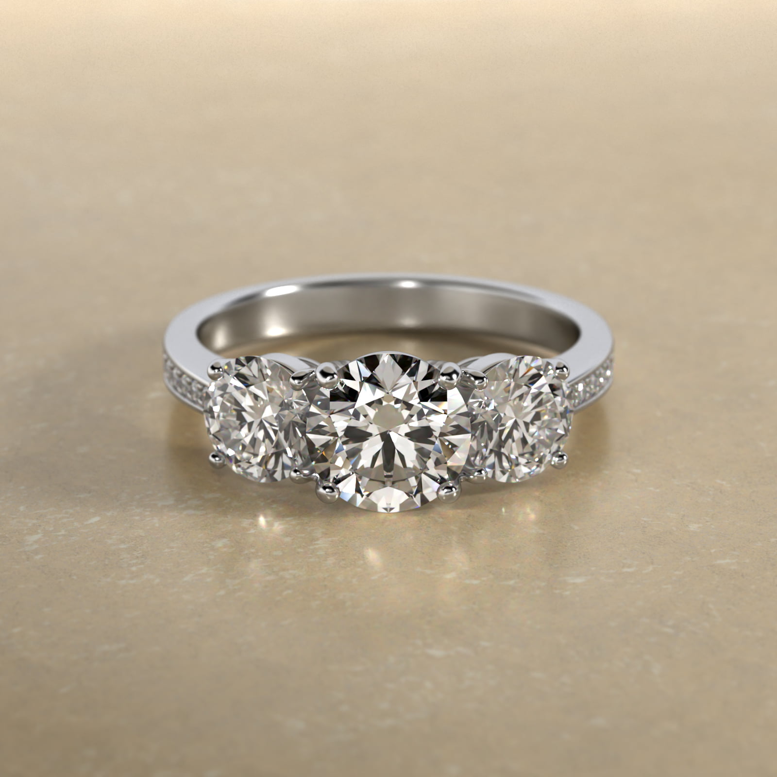 Round Diamond Three Stone Engagement Ring With Pavé Set Diamonds In 14K White Gold