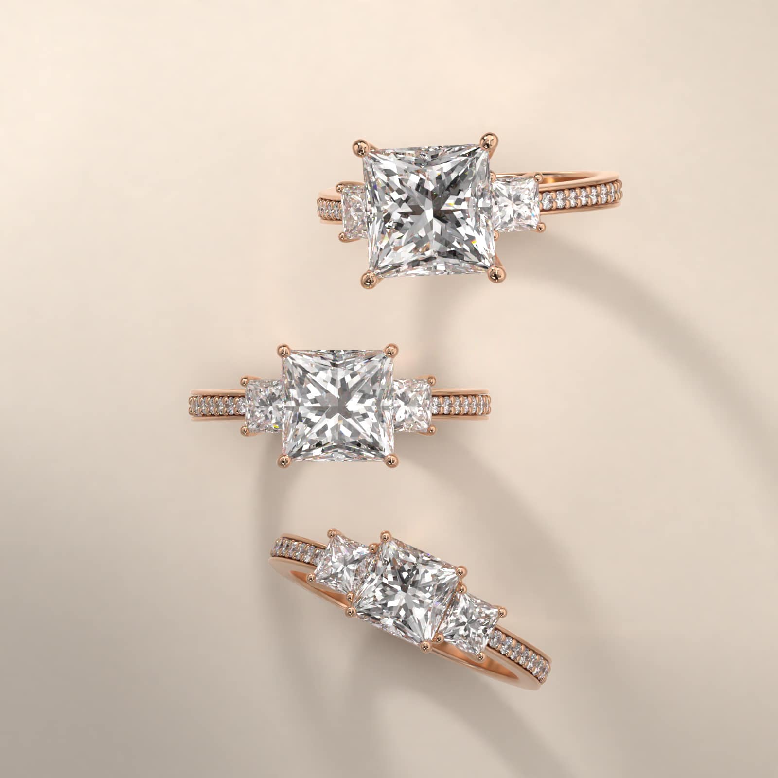 Princess Cut Diamond Three Stone Engagement Ring With Pavé Set Diamonds In 14K Rose Gold