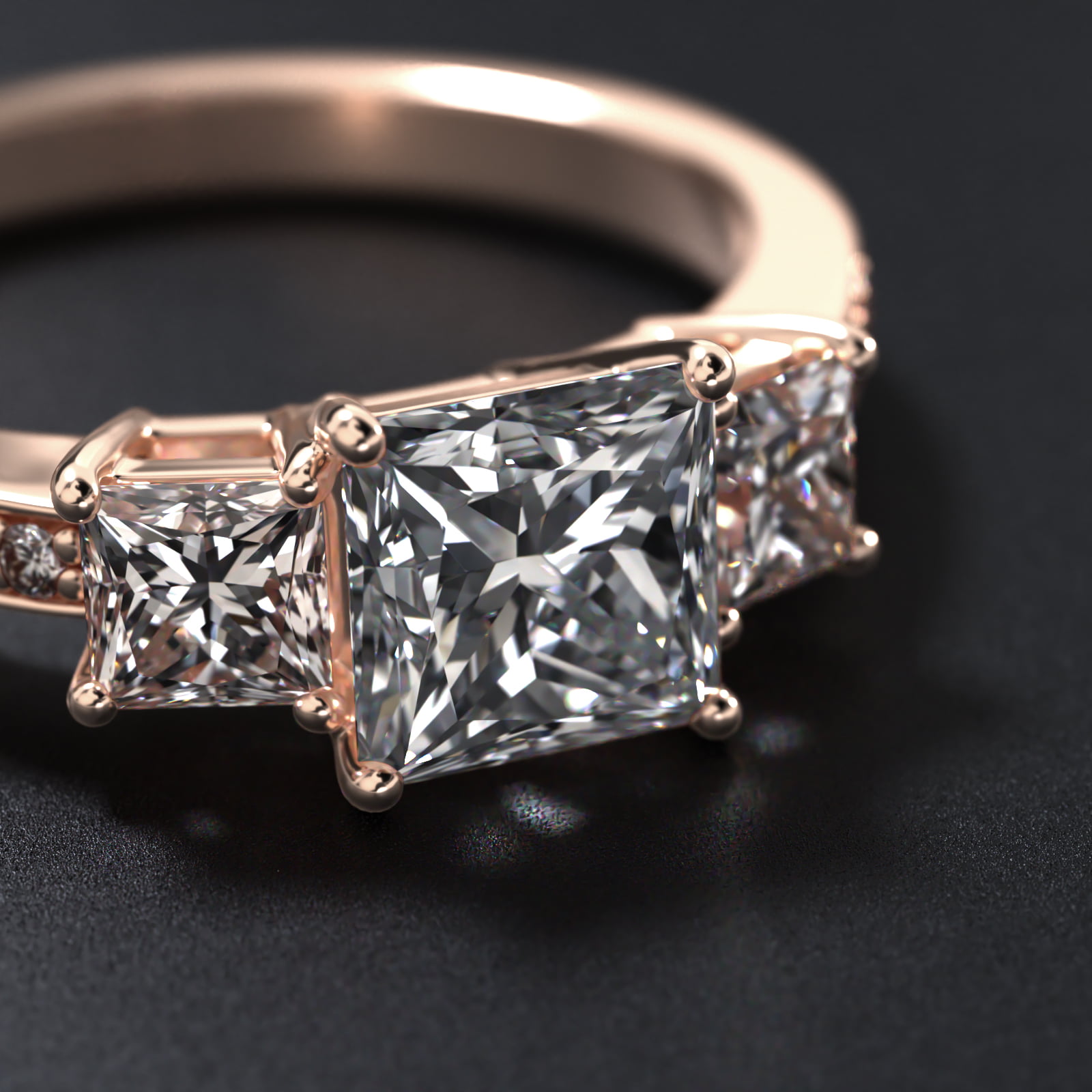 Princess Cut Diamond Three Stone Engagement Ring With Pavé Set Diamonds In 14K Rose Gold