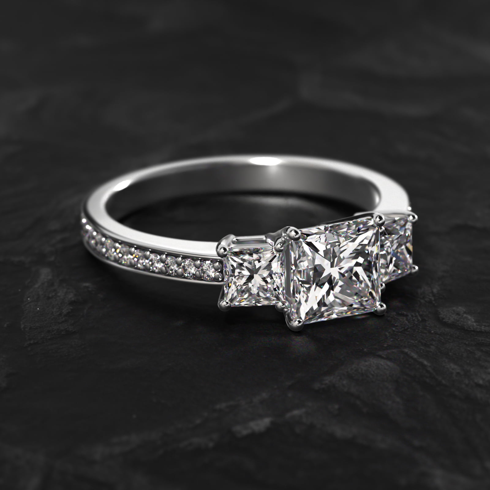 Princess Cut Diamond Three Stone Engagement Ring With Pavé Set Diamonds In 18K White Gold
