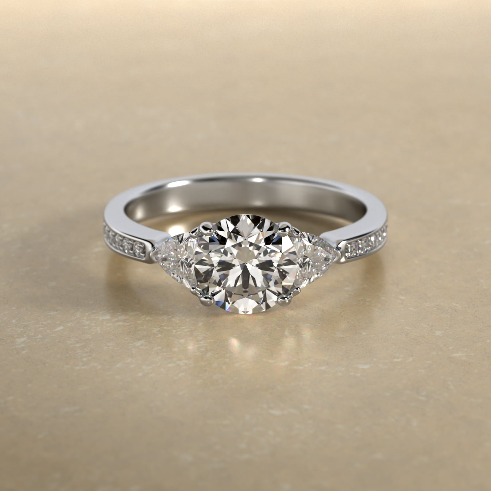 Trillion Cut Diamond Three Stone Engagement Ring With Pavé Set Diamonds In Platinum