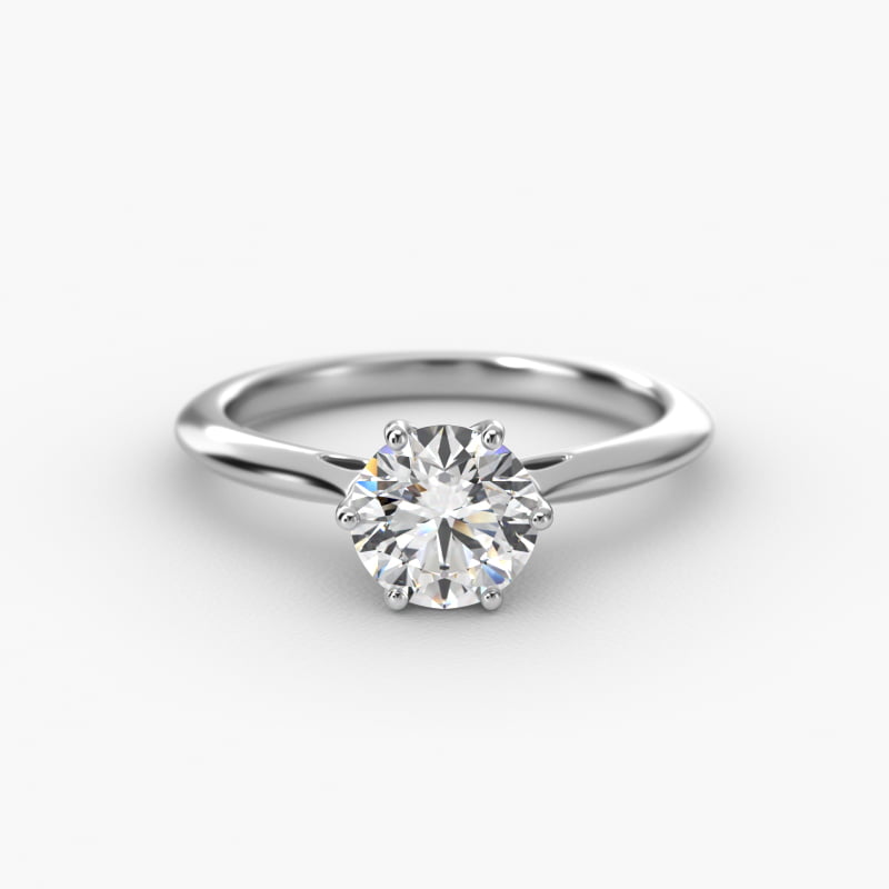 Knife Edge Solitaire Engagement Ring With Intricate Basket In Platinum