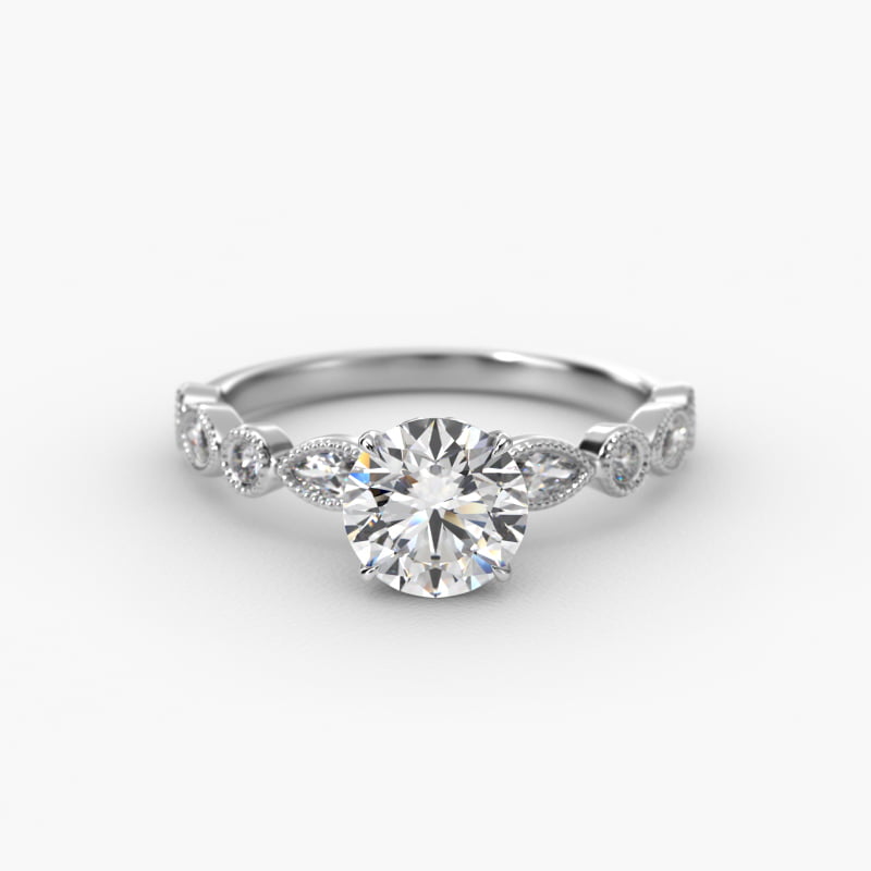Round and Marquise Cut Side Stone Diamond Engagement Ring In Platinum