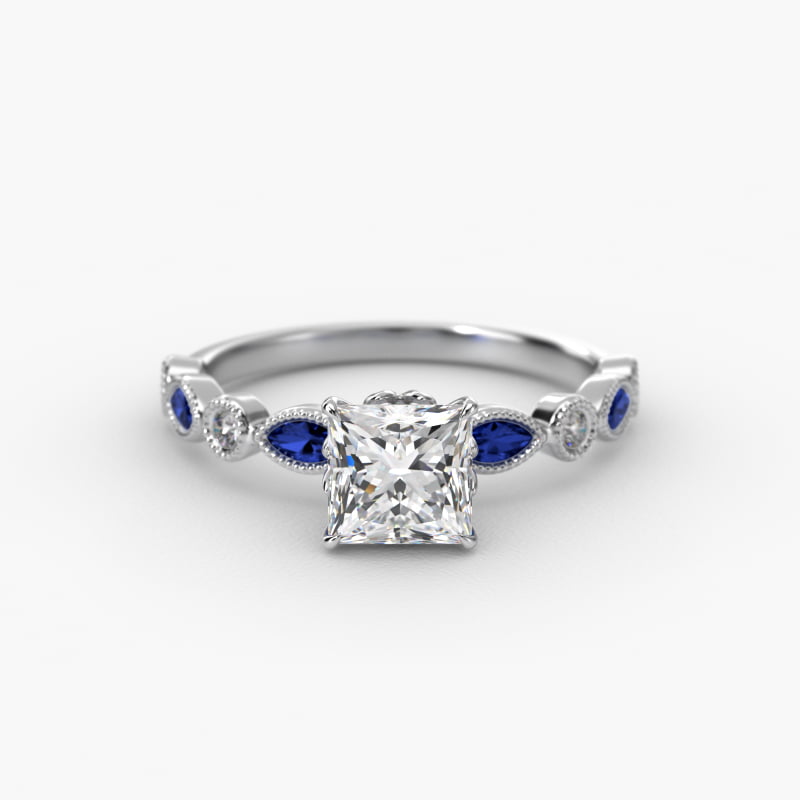 Vintage Round Diamond and Marquise Sapphire Side Stone Engagement Ring In Platinum
