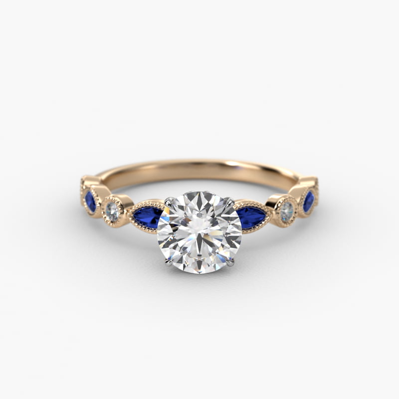 Vintage Round Diamond and Marquise Sapphire Side Stone Engagement Ring In 14K Yellow Gold