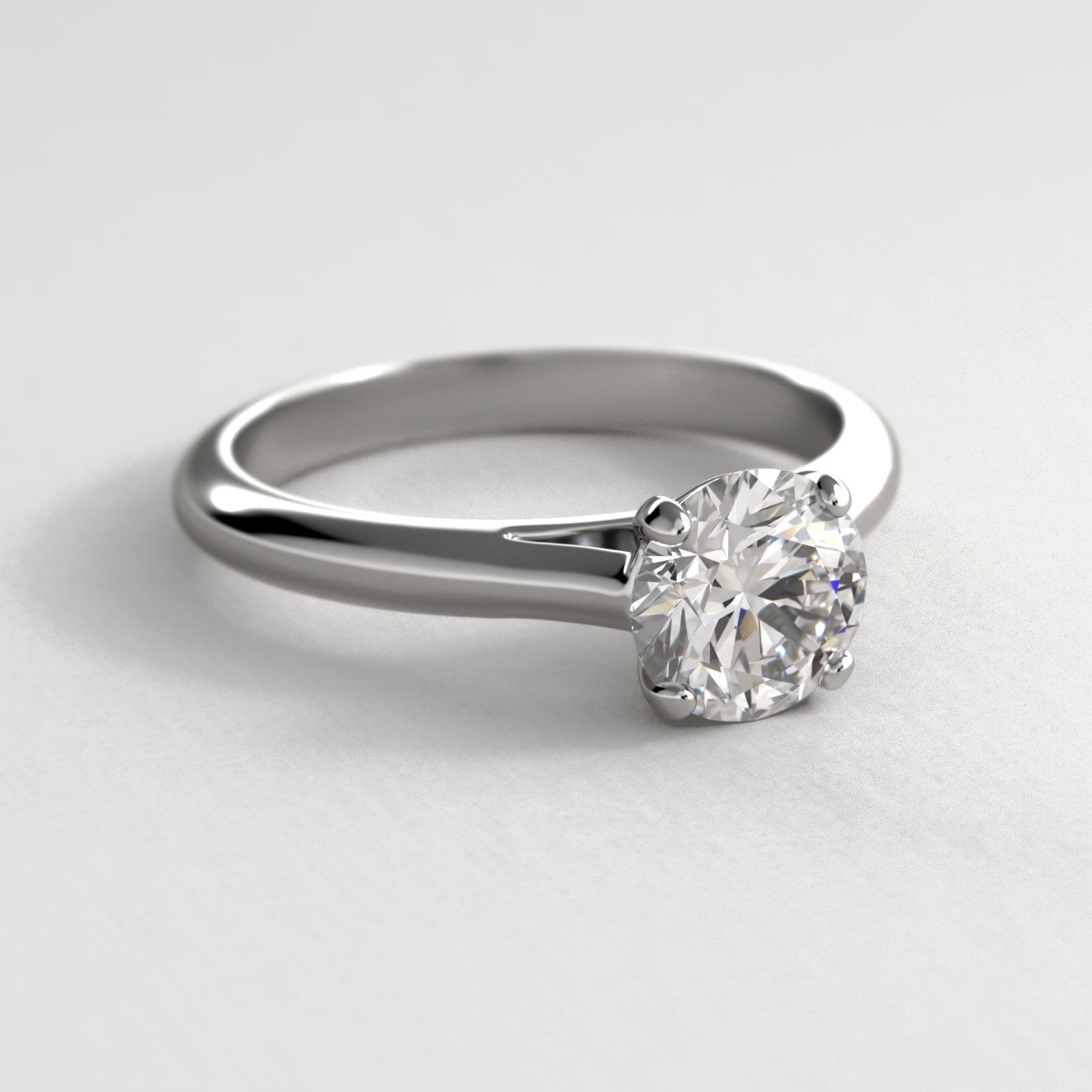 Sleek Solitaire Engagement Ring In 14K White Gold