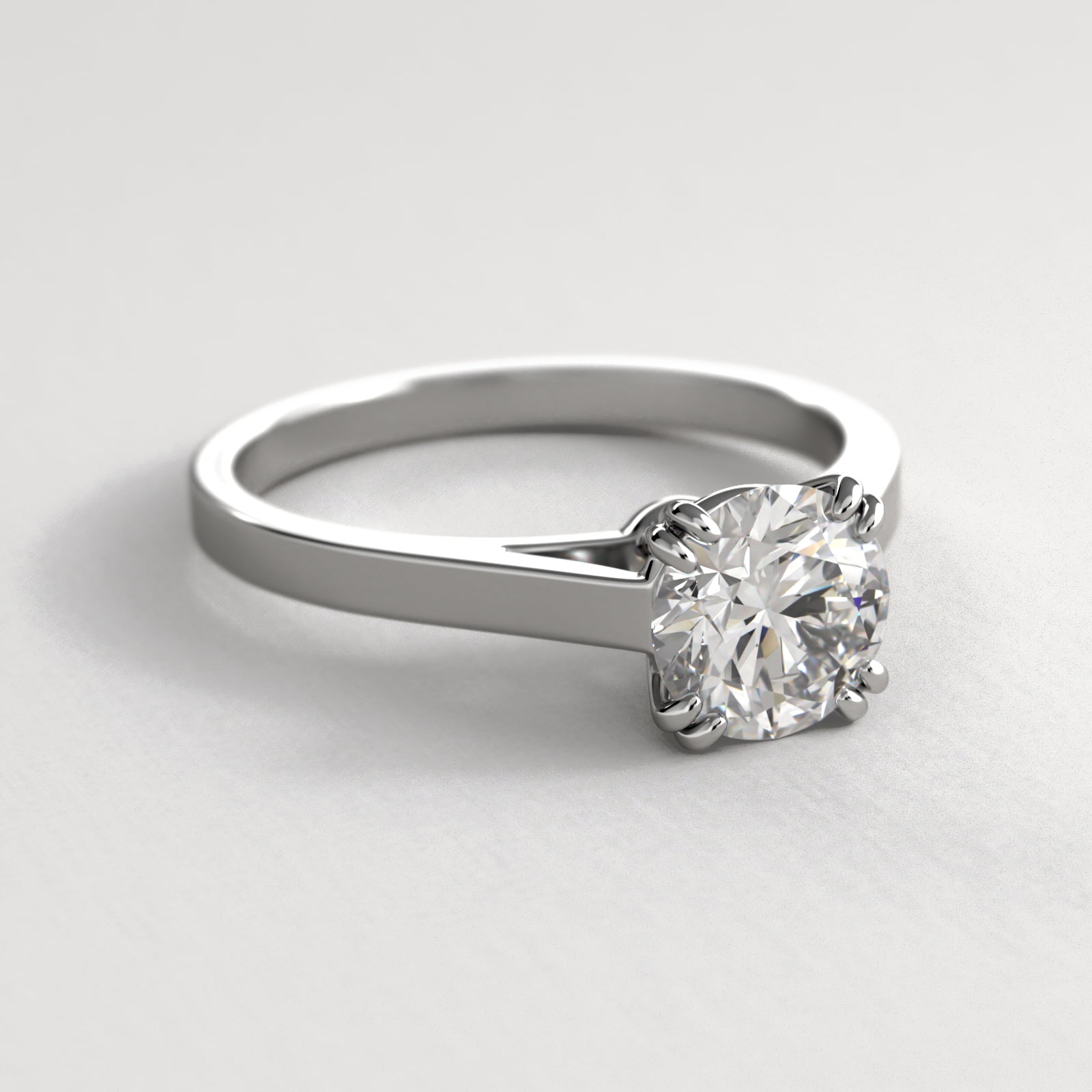 Double Claw Prong Solitaire Engagement Ring In Platinum