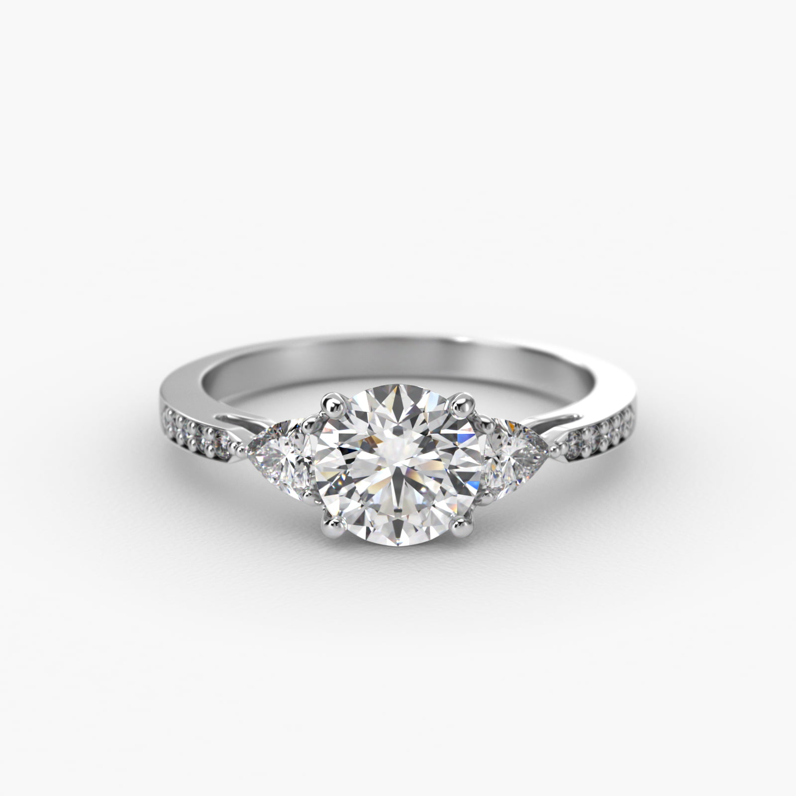 Trillion Cut Diamond Three Stone Engagement Ring With Pavé Set Diamonds In Platinum