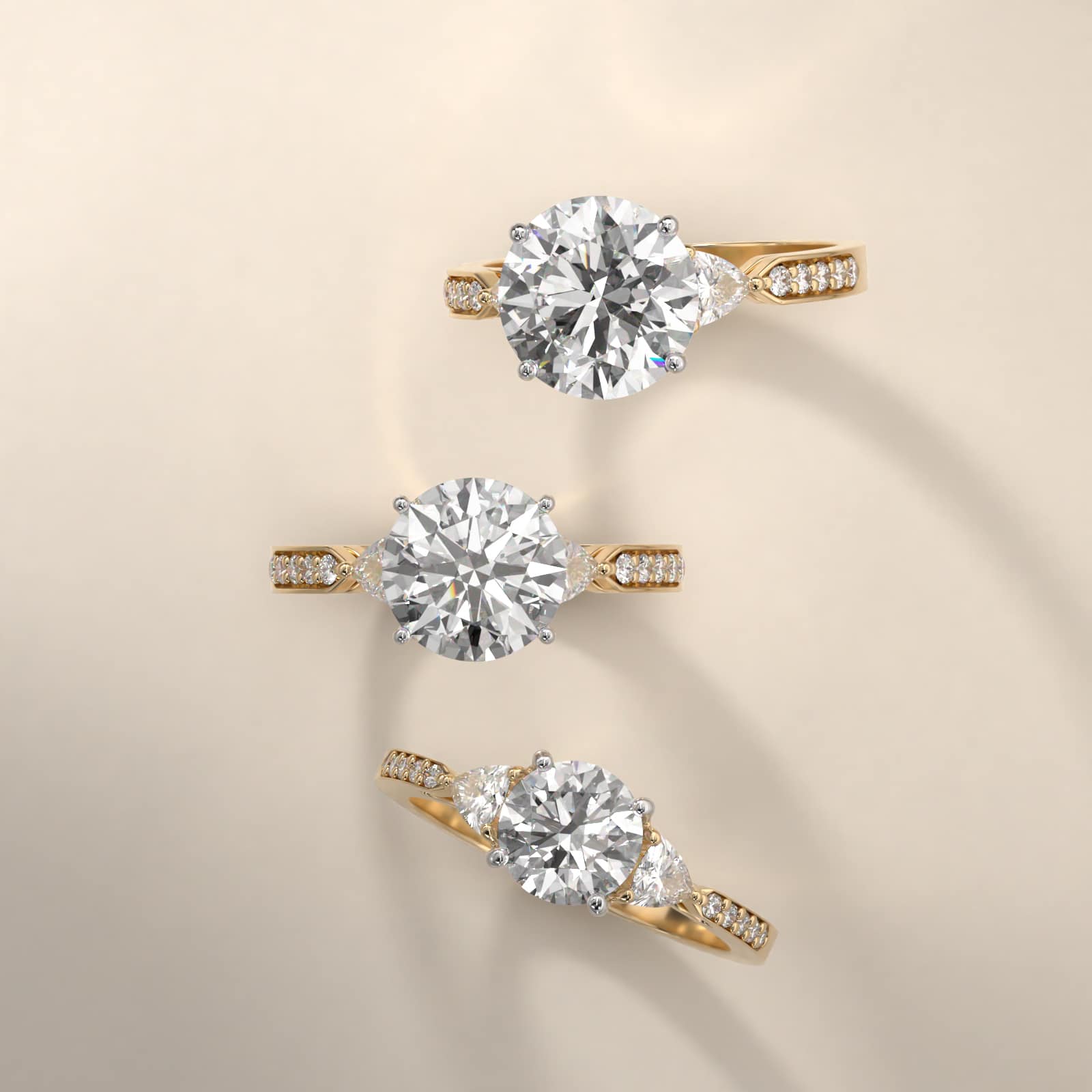 Trillion Cut Diamond Three Stone Engagement Ring With Pavé Set Diamonds In 18K Yellow Gold