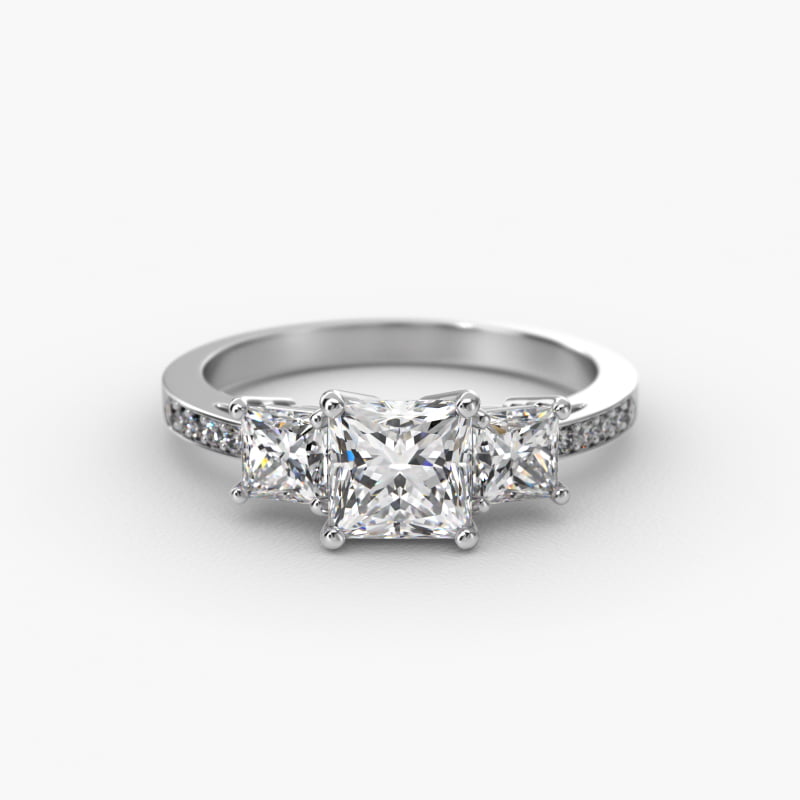 Princess Cut Diamond Three Stone Engagement Ring With Pavé Set Diamonds In 18K White Gold