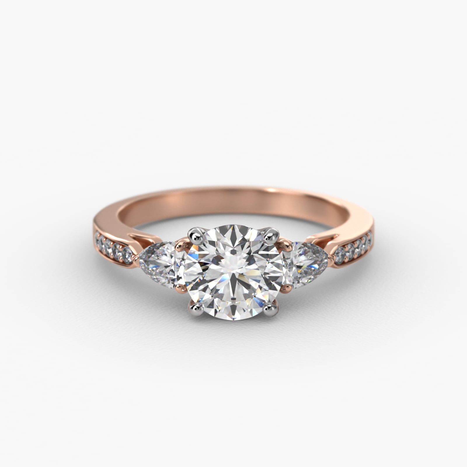 Pear Shaped Diamond Three Stone Engagement Ring With Pavé Set Diamonds In 14K Rose Gold