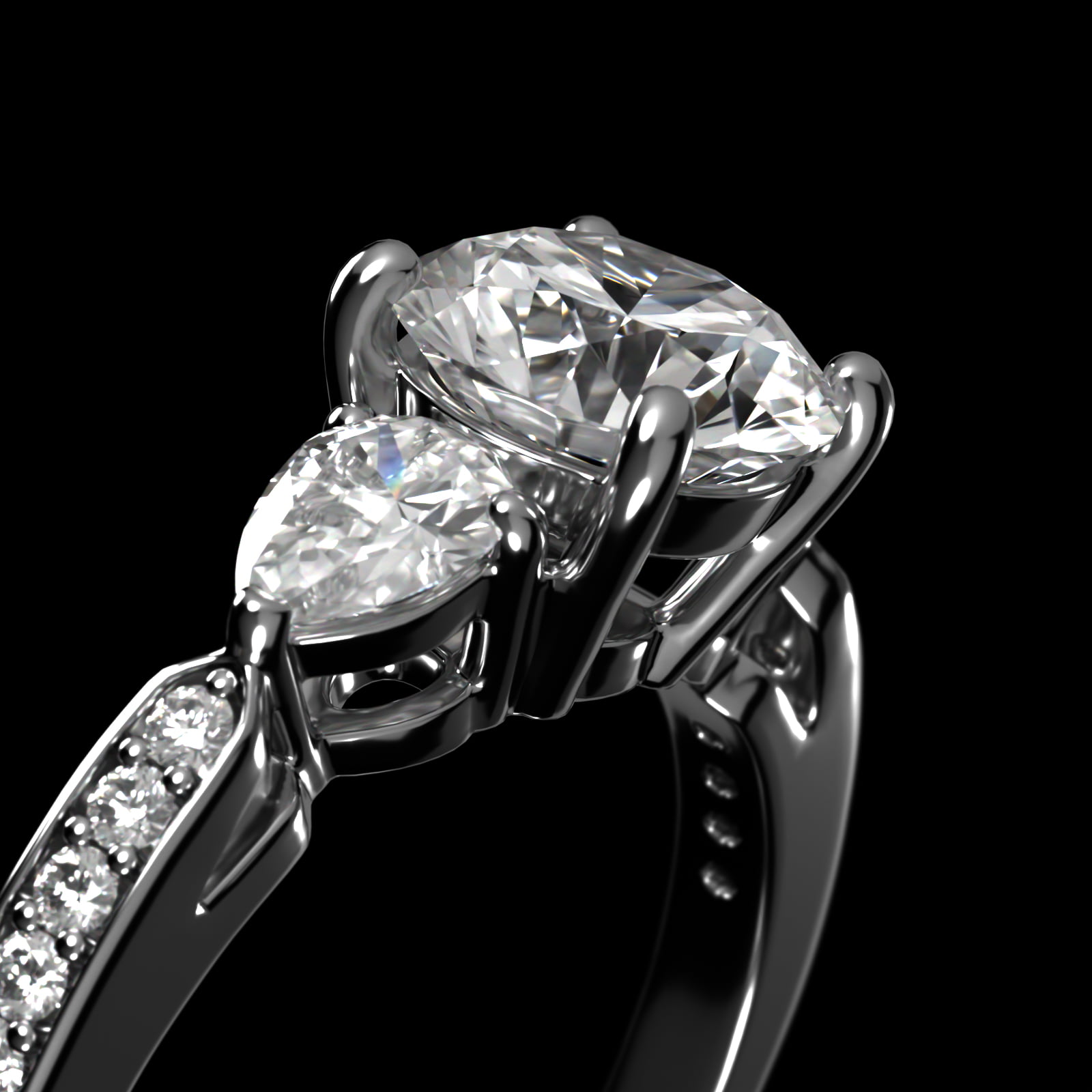 Pear Shaped Diamond Three Stone Engagement Ring With Pavé Set Diamonds In Platinum