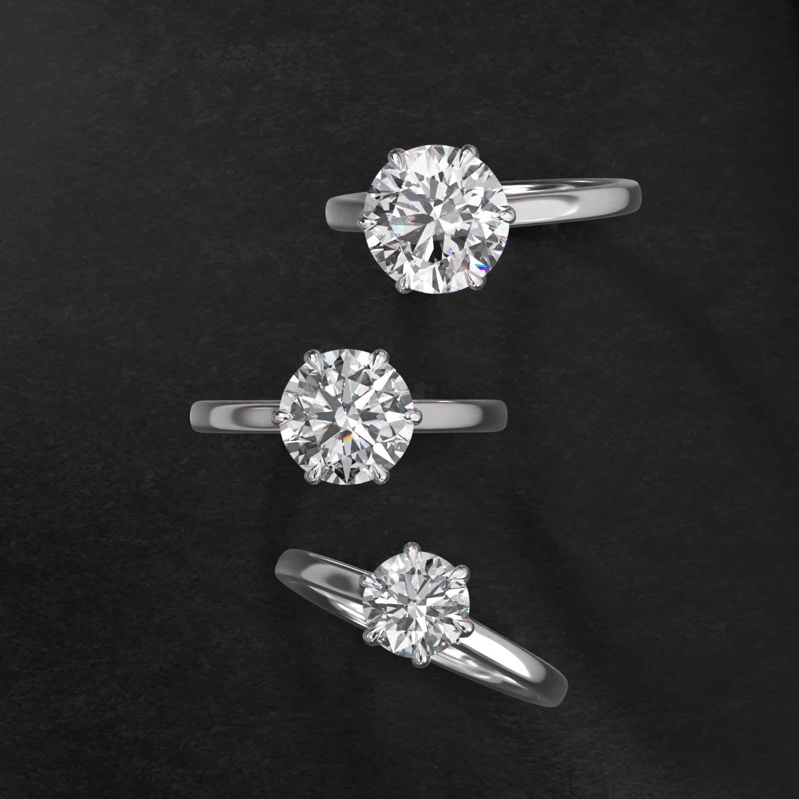 Tapered Six Prong Solitaire Engagement Ring In 18K White Gold