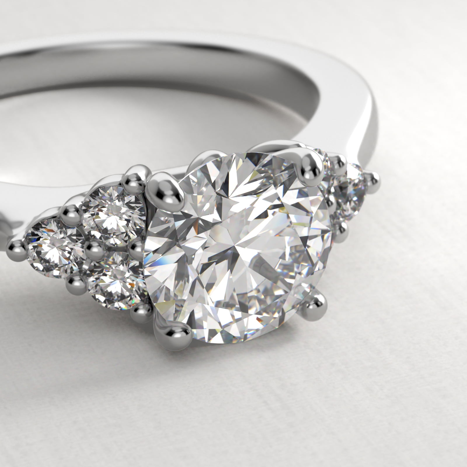 Triple Side Stone Diamond Engagement Ring In 14K White Gold