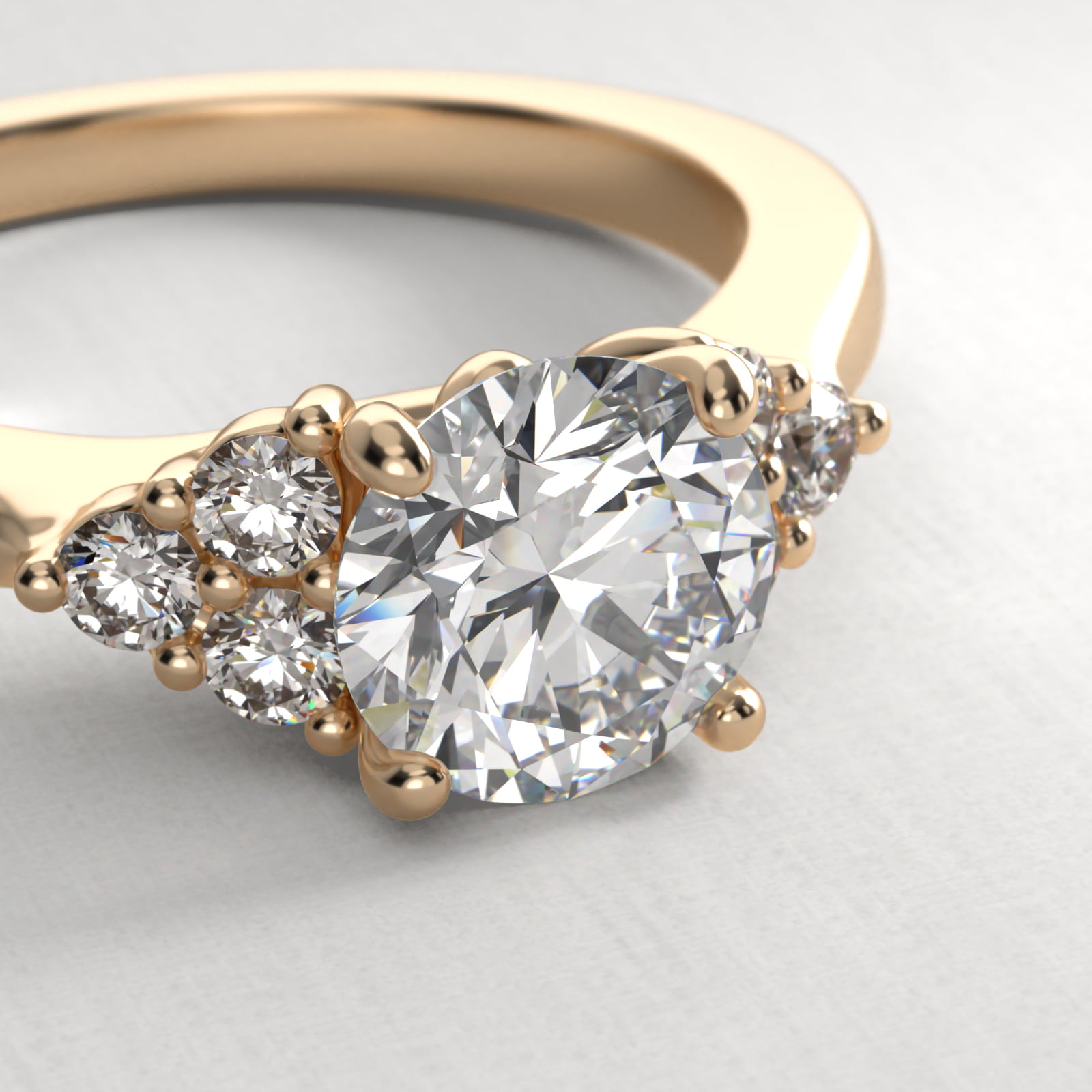 Triple Side Stone Diamond Engagement Ring In 18K Yellow Gold