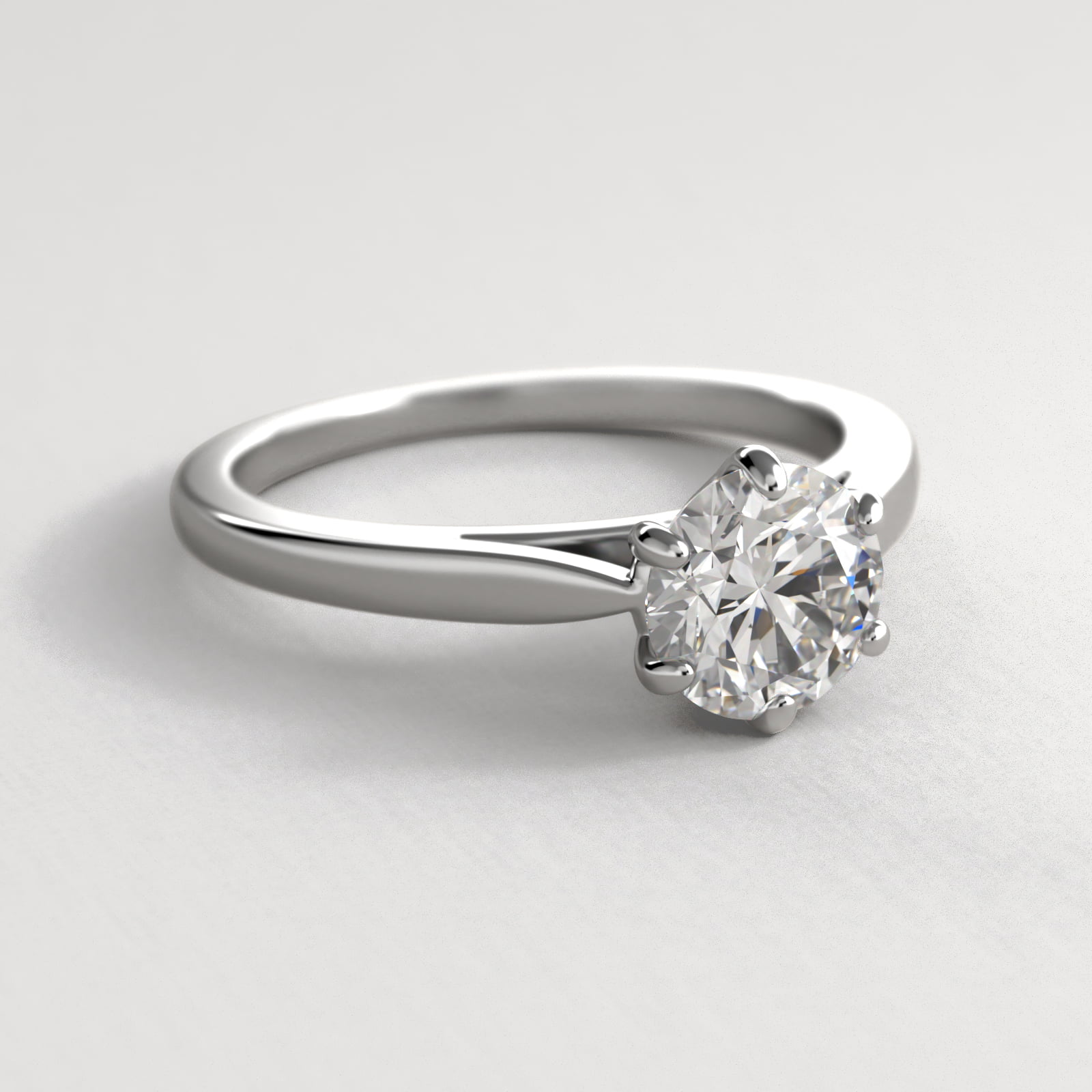 Petite Flower Solitaire Engagement Ring In Platinum