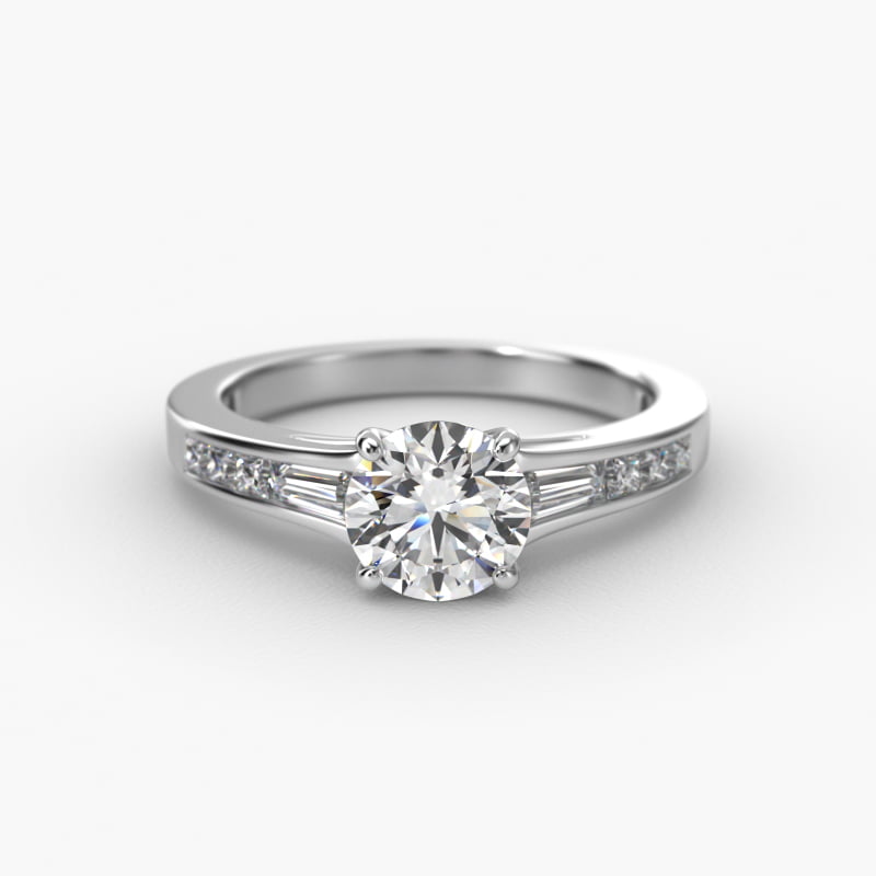 Engagement Ring With Channel Set Tapered Baguette And Princess Cut Diamonds In Platinum
