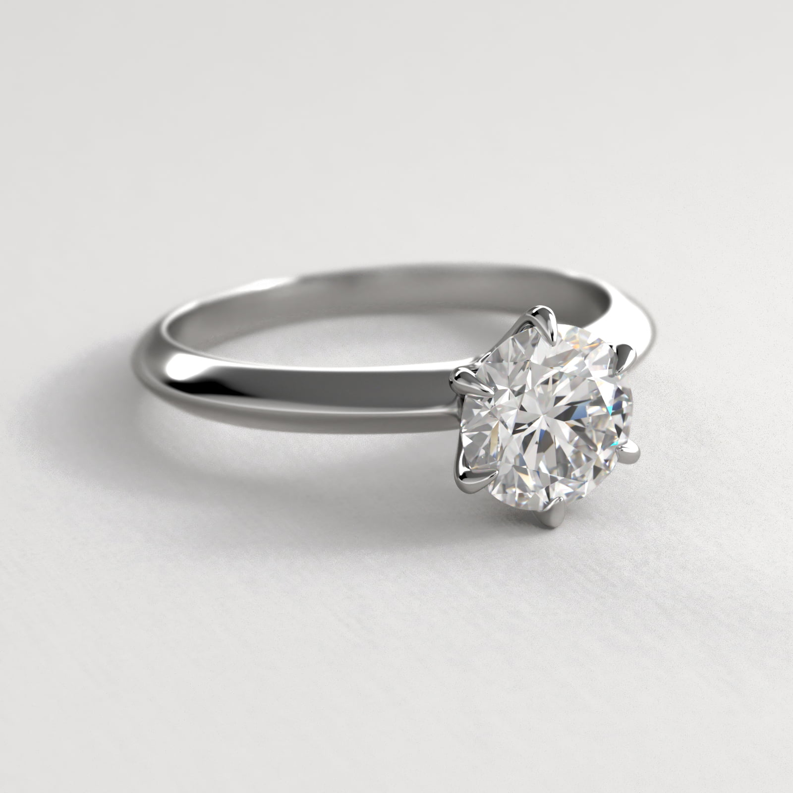 Knife Edge Six Prong Solitaire Engagement Ring In 18K White Gold