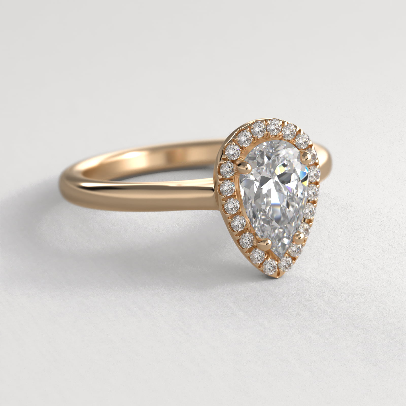 Pavé Diamond Halo Engagement Ring In 14K Yellow Gold (Pear)