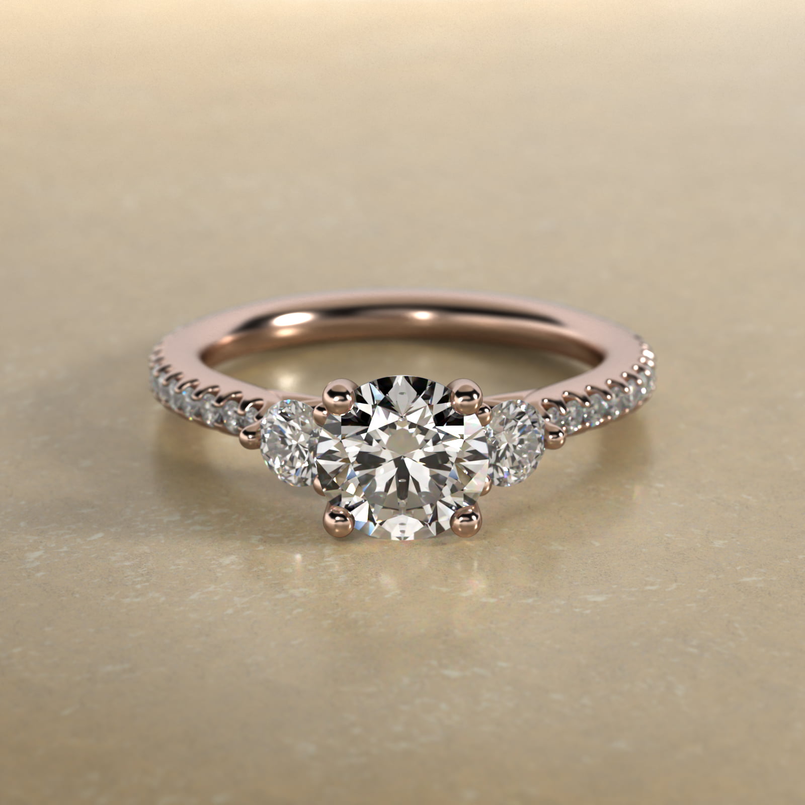 Round Diamond Three Stone Engagement Ring With Cross Prong And Pavé Set Diamonds In 14K Rose Gold