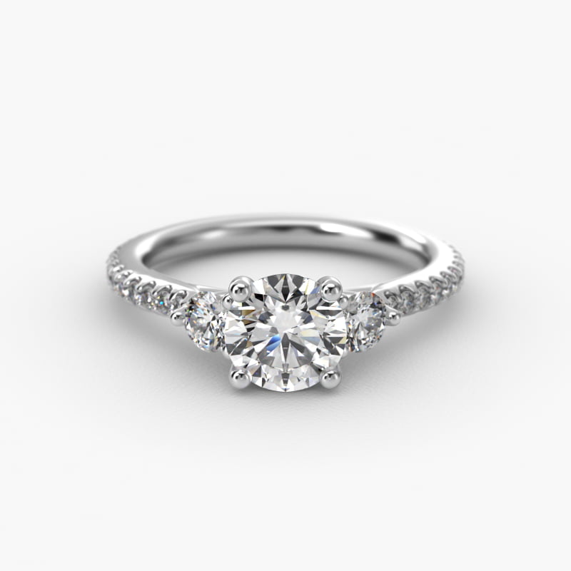 Round Diamond Three Stone Engagement Ring With Cross Prong And Pavé Set Diamonds In Platinum