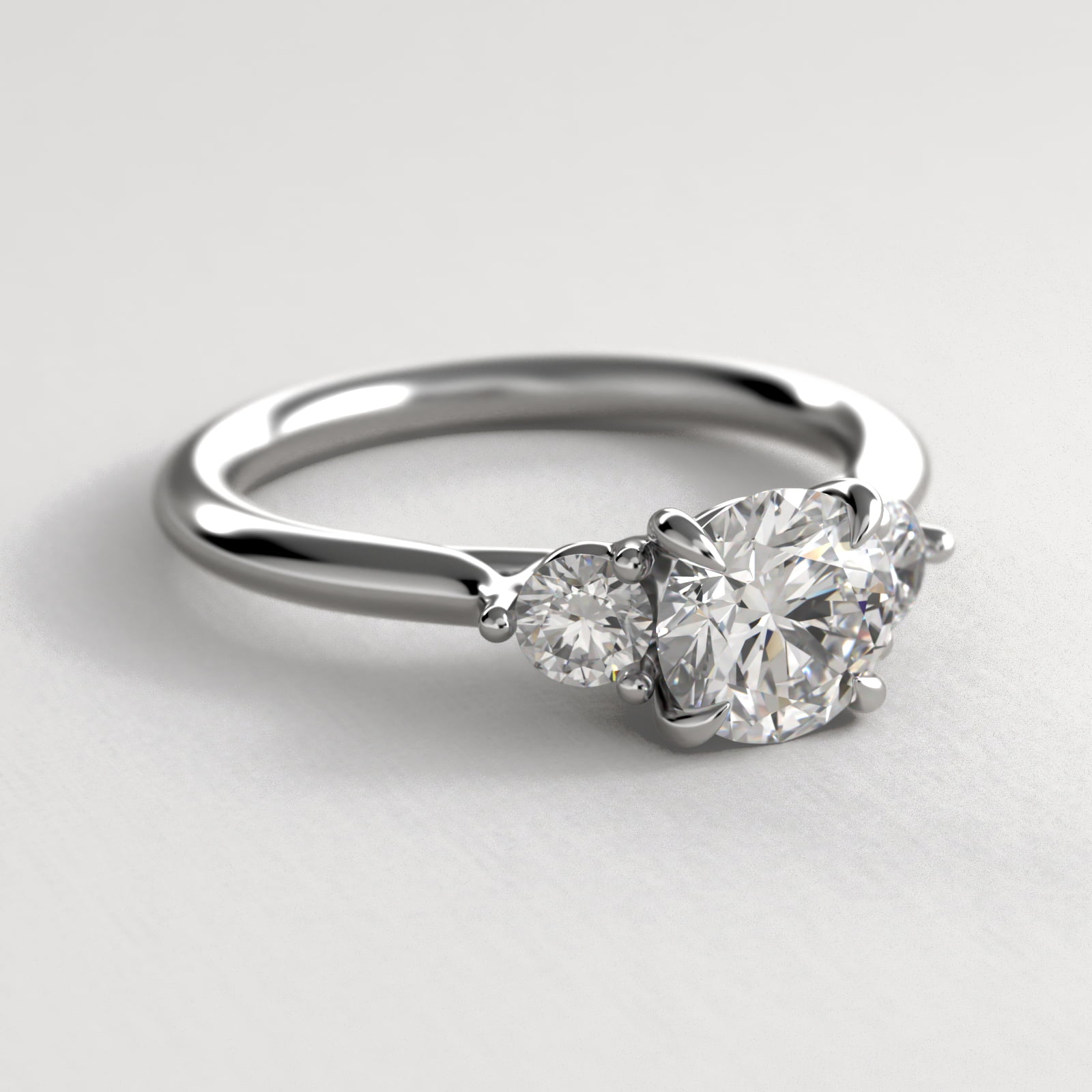 Classic Round Diamond Three Stone Engagement Ring In 18K White Gold