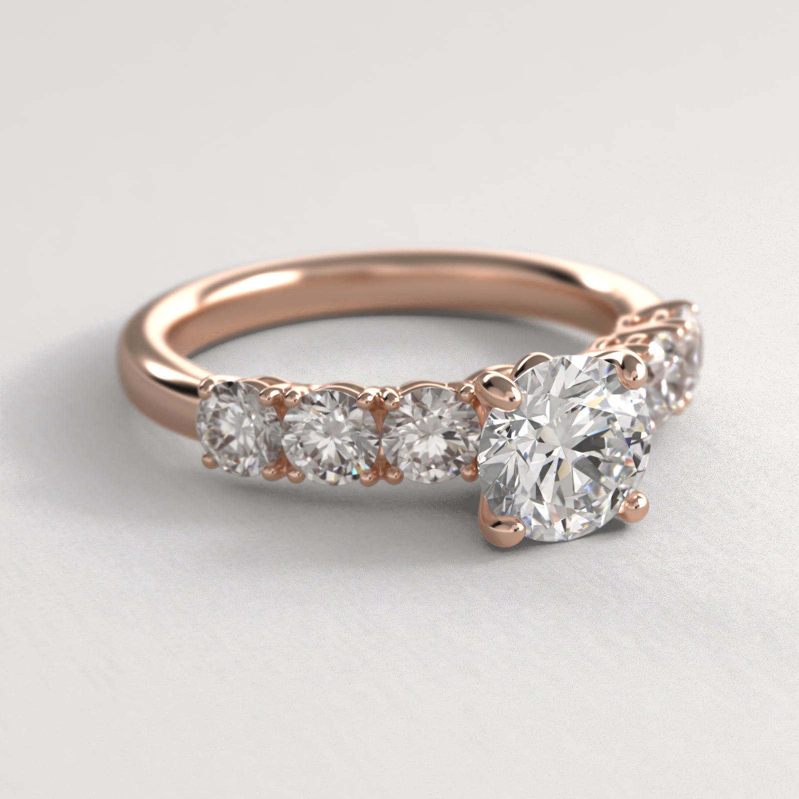 Prong Set Side Stone Diamond Engagement Ring In 14K Rose Gold