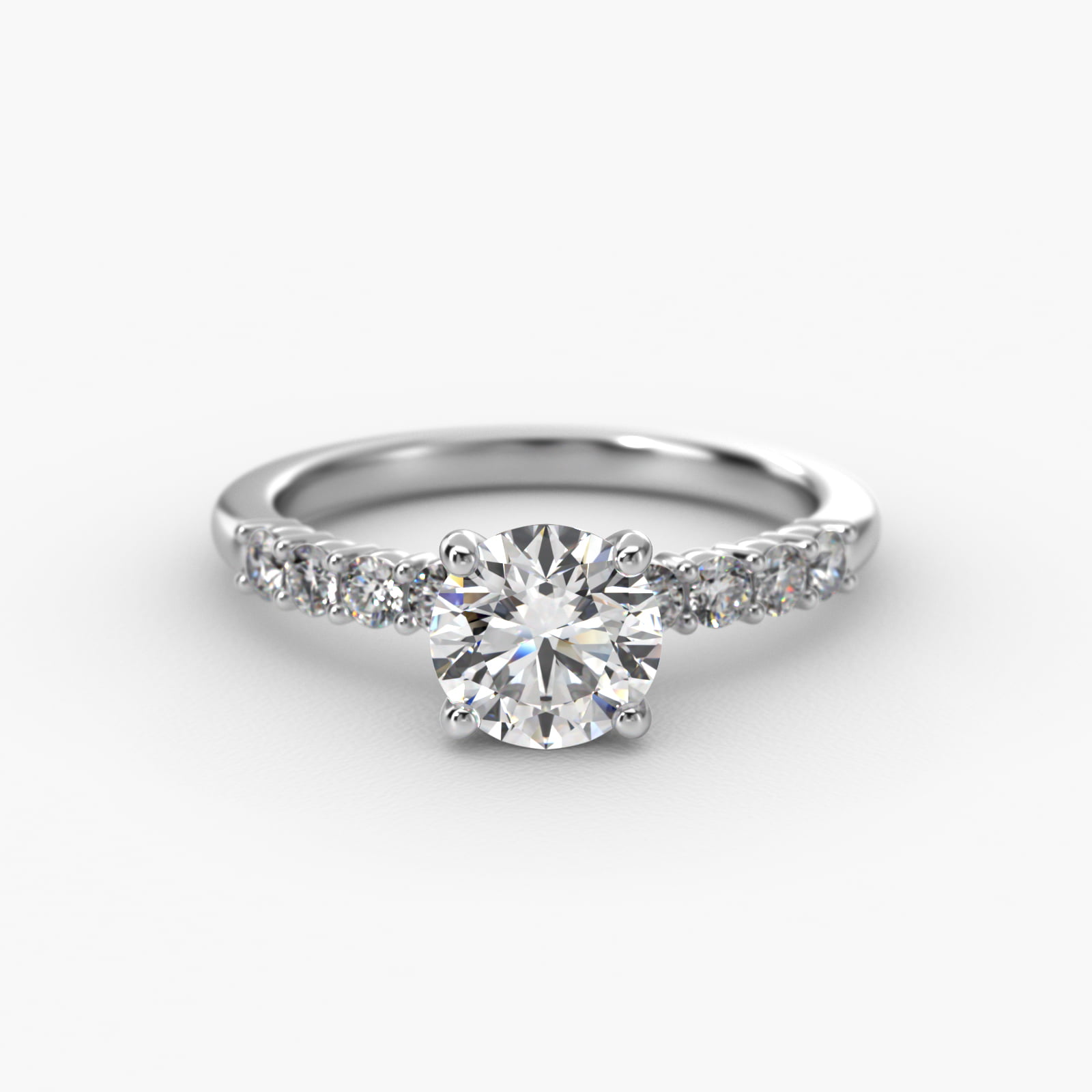 Prong Set Side Stone Diamond Engagement Ring In 18K White Gold