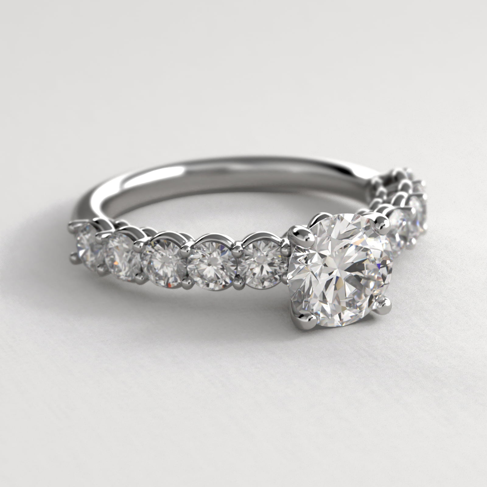 Prong Set Side Stone Diamond Engagement Ring In 14K White Gold