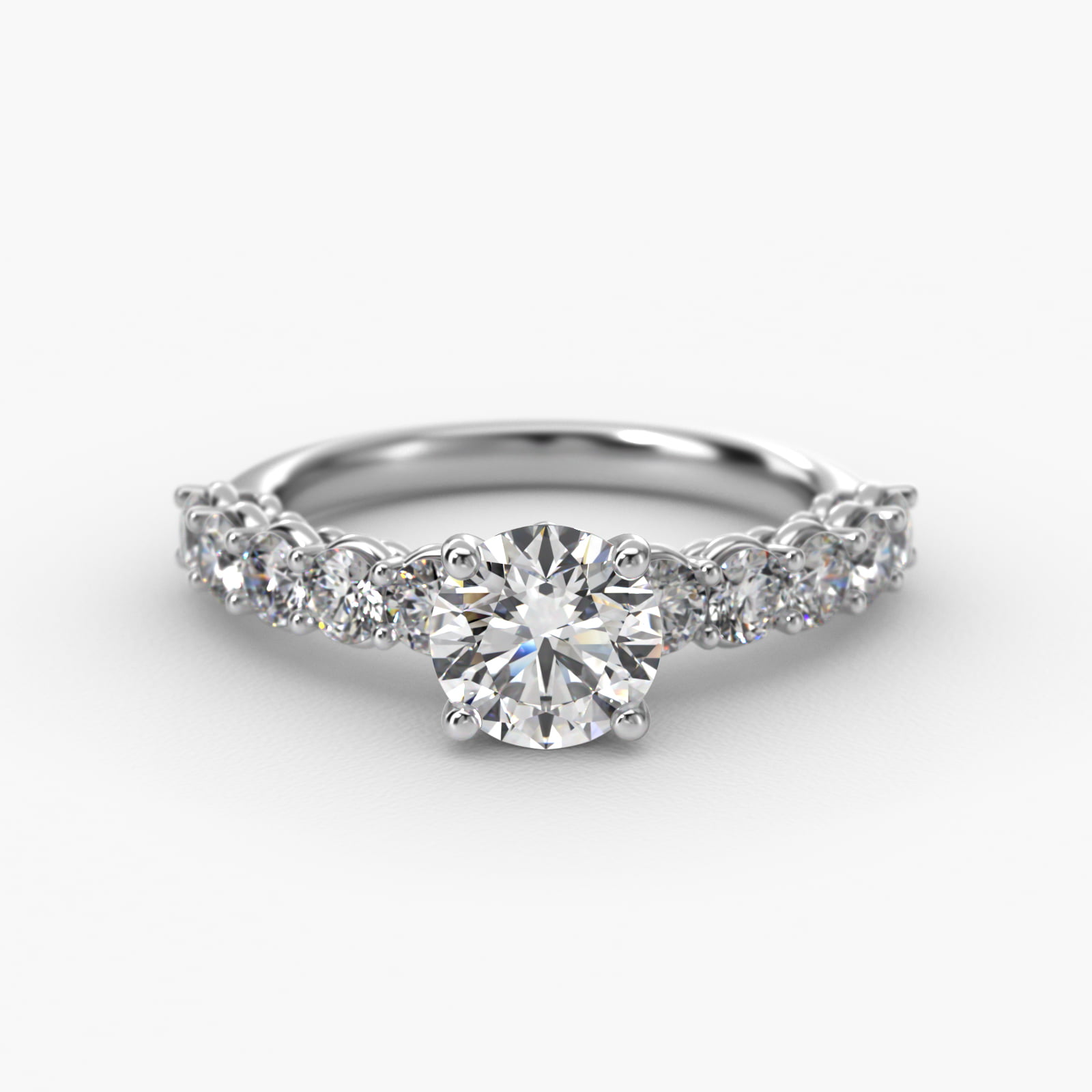 Prong Set Side Stone Diamond Engagement Ring In 18K White Gold