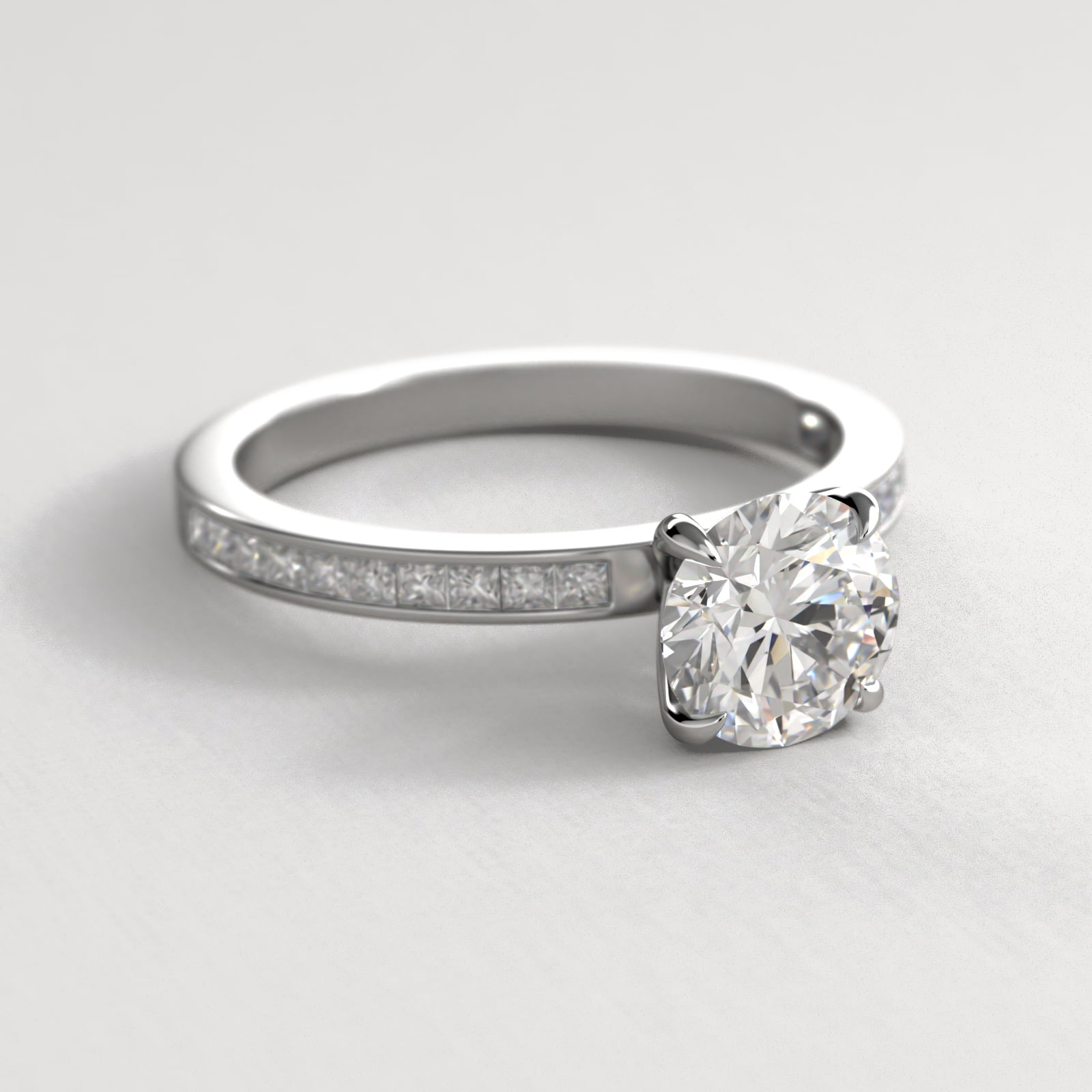 Engagement Ring With Channel Set Princess Cut Diamonds In 18K White Gold