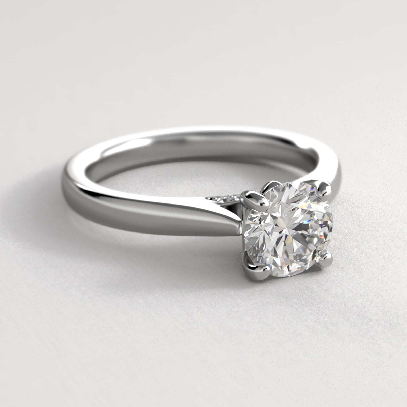 Tapered Solitaire Engagement Ring With Pavé Accent In Platinum