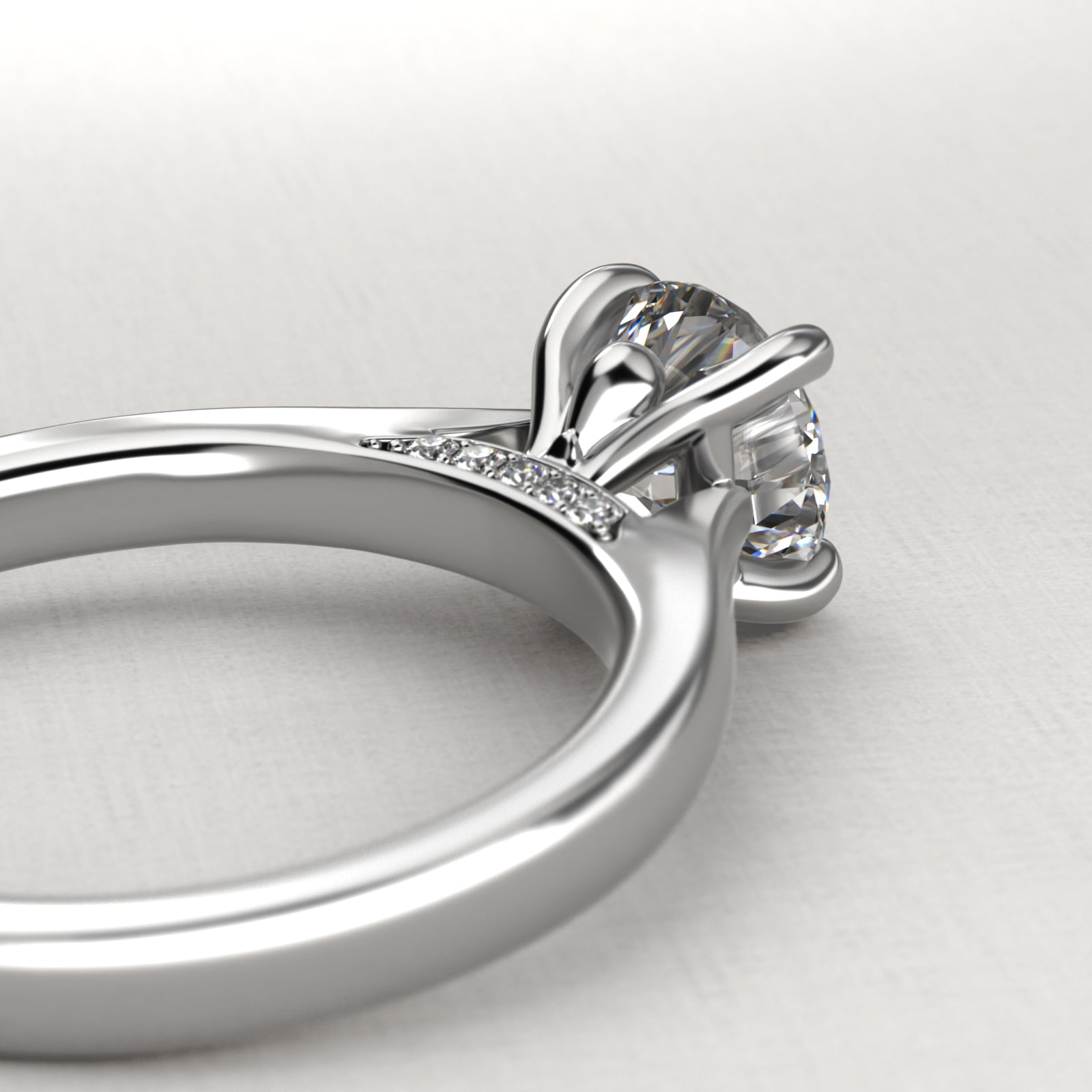 Tapered Solitaire Engagement Ring With Pavé Accent In Platinum