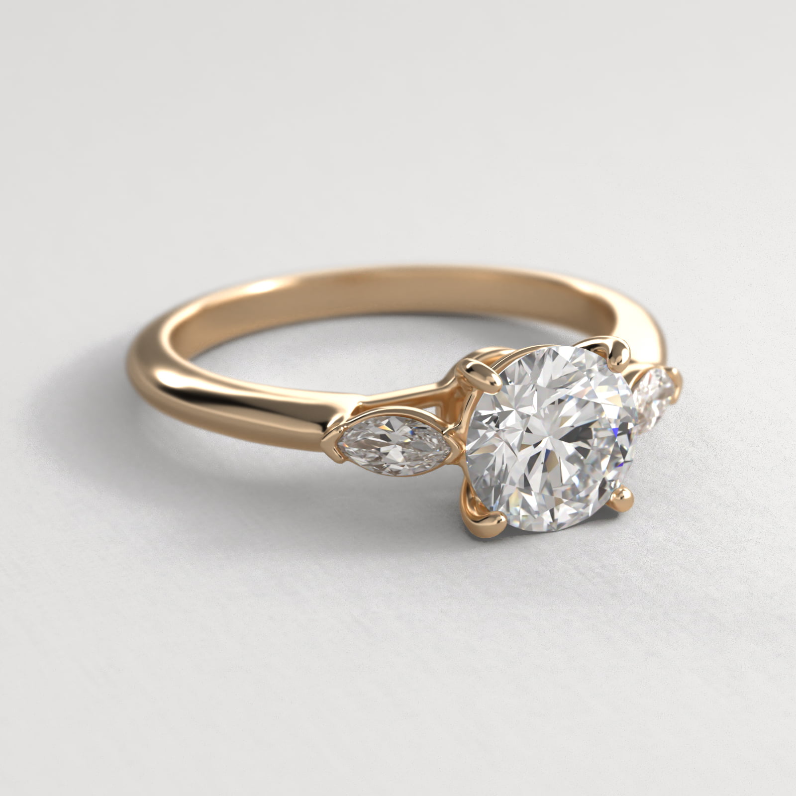 Marquise Cut Diamond Three Stone Engagement Ring In 14K Yellow Gold